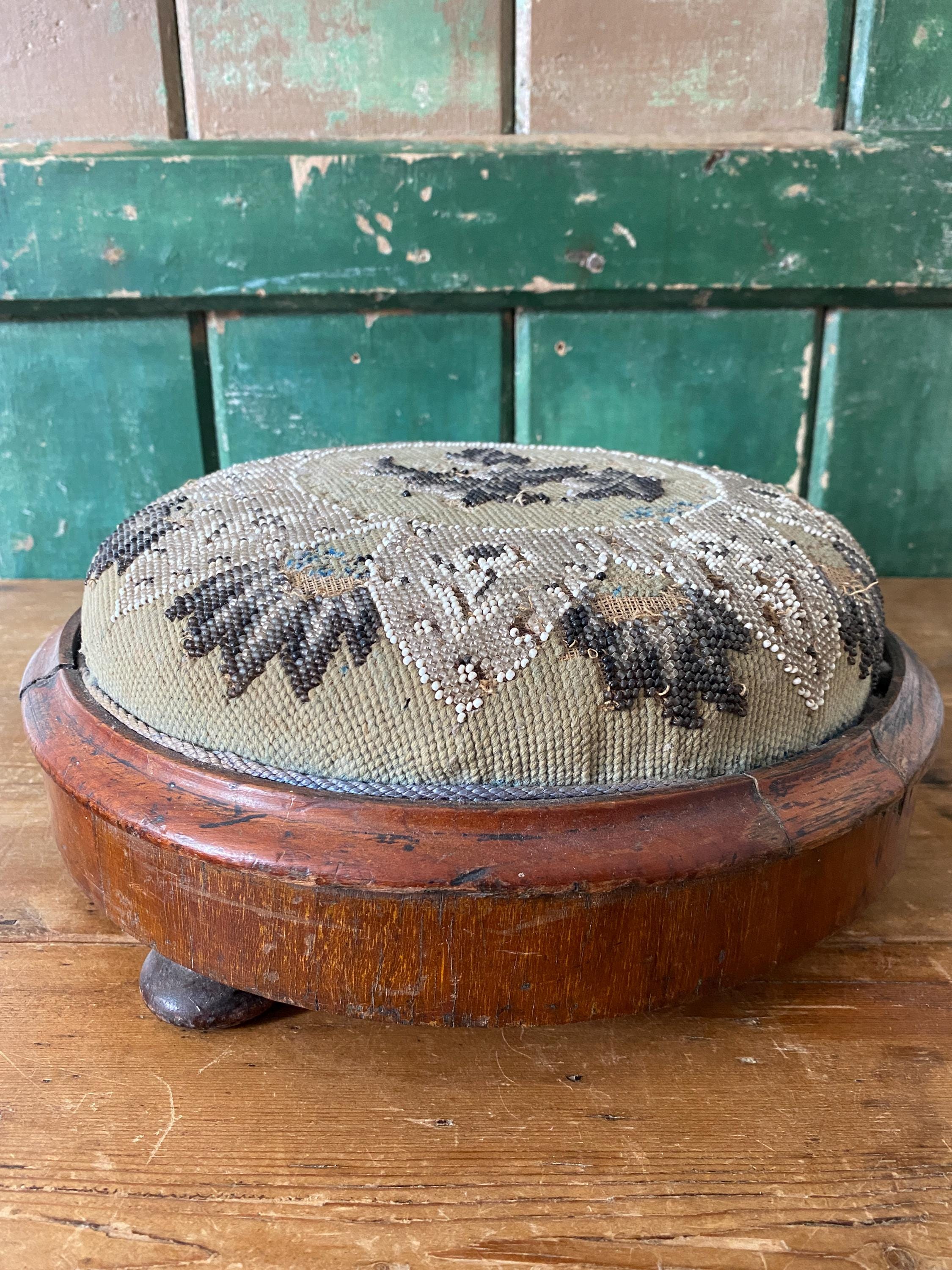 Embroidered footstool