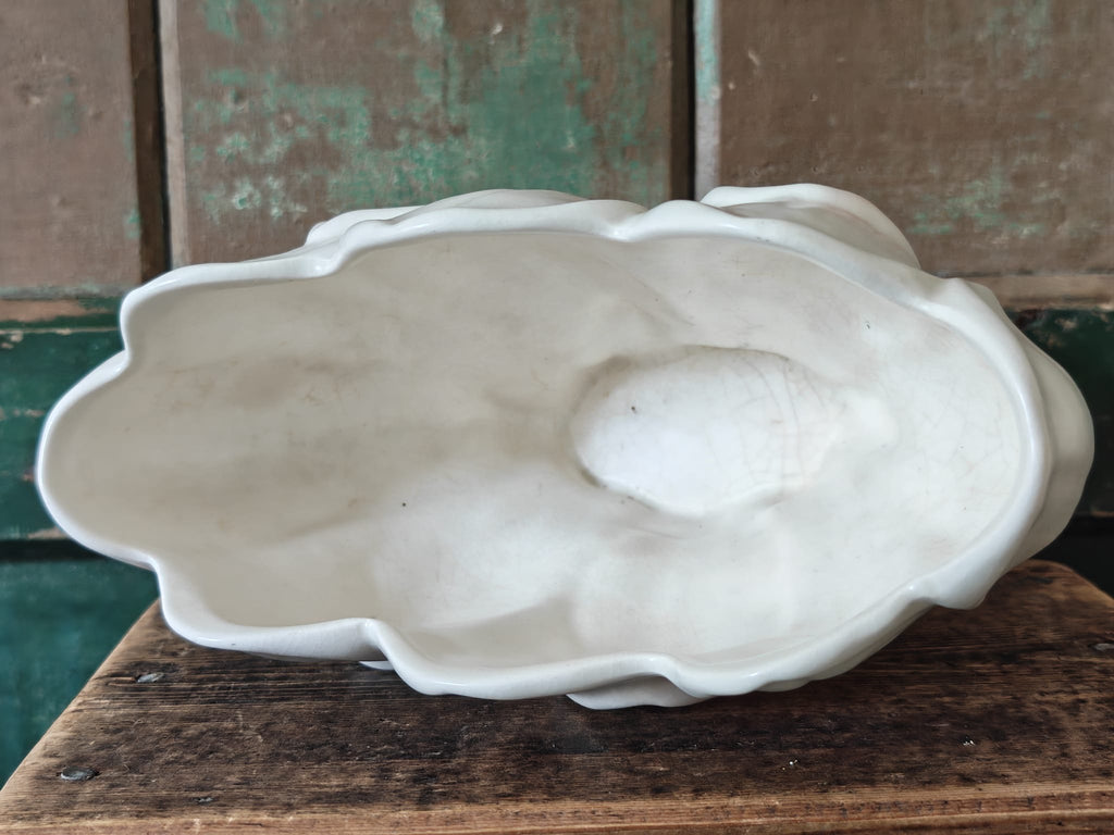 Interior view of A vintage-style ceramic flower vase.