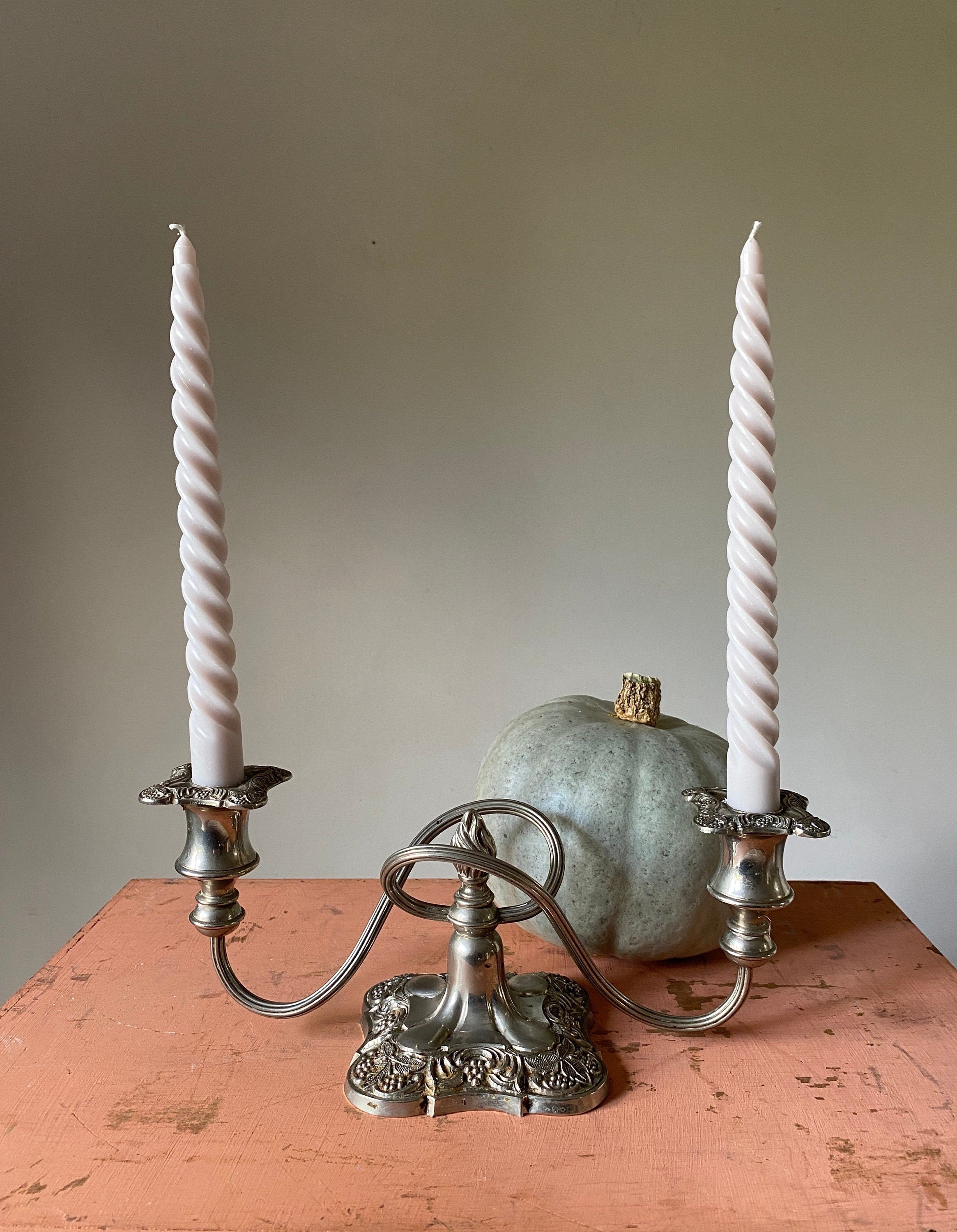 Vintage silver double candelabra with ornate square base