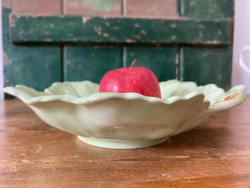 Side view of a decorative ceramic leaf-shaped dish