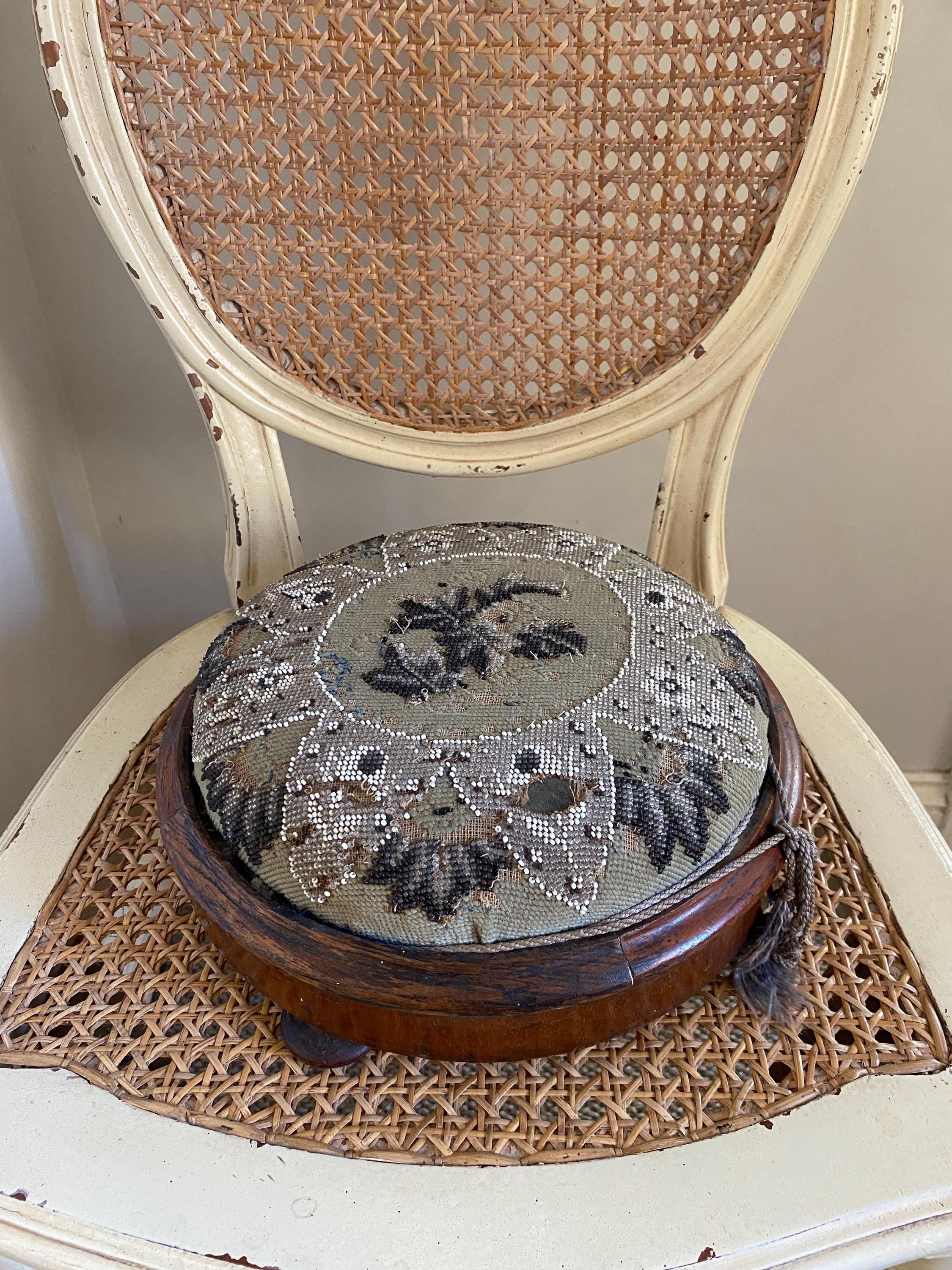 Decorative footstool with floral pattern 