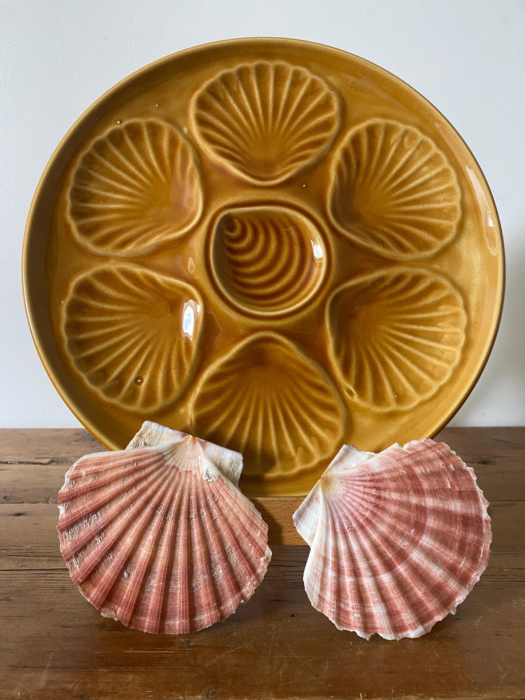 Majolica oyster plate with tan glaze