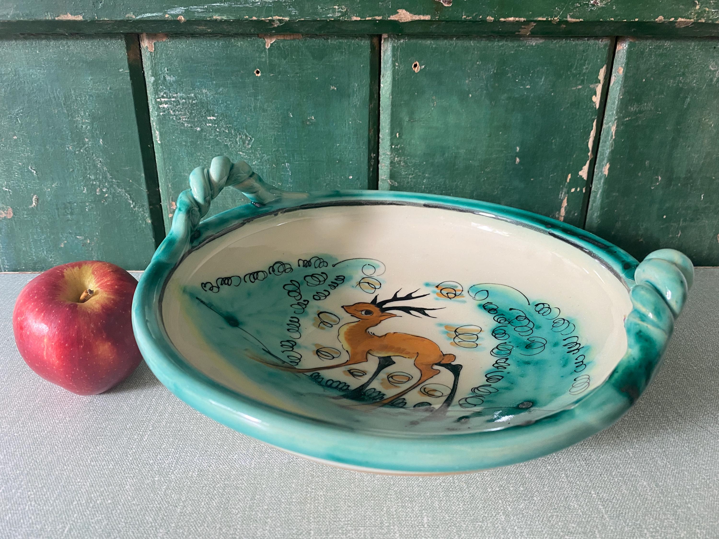 Decorative ceramic bowl with deer design 