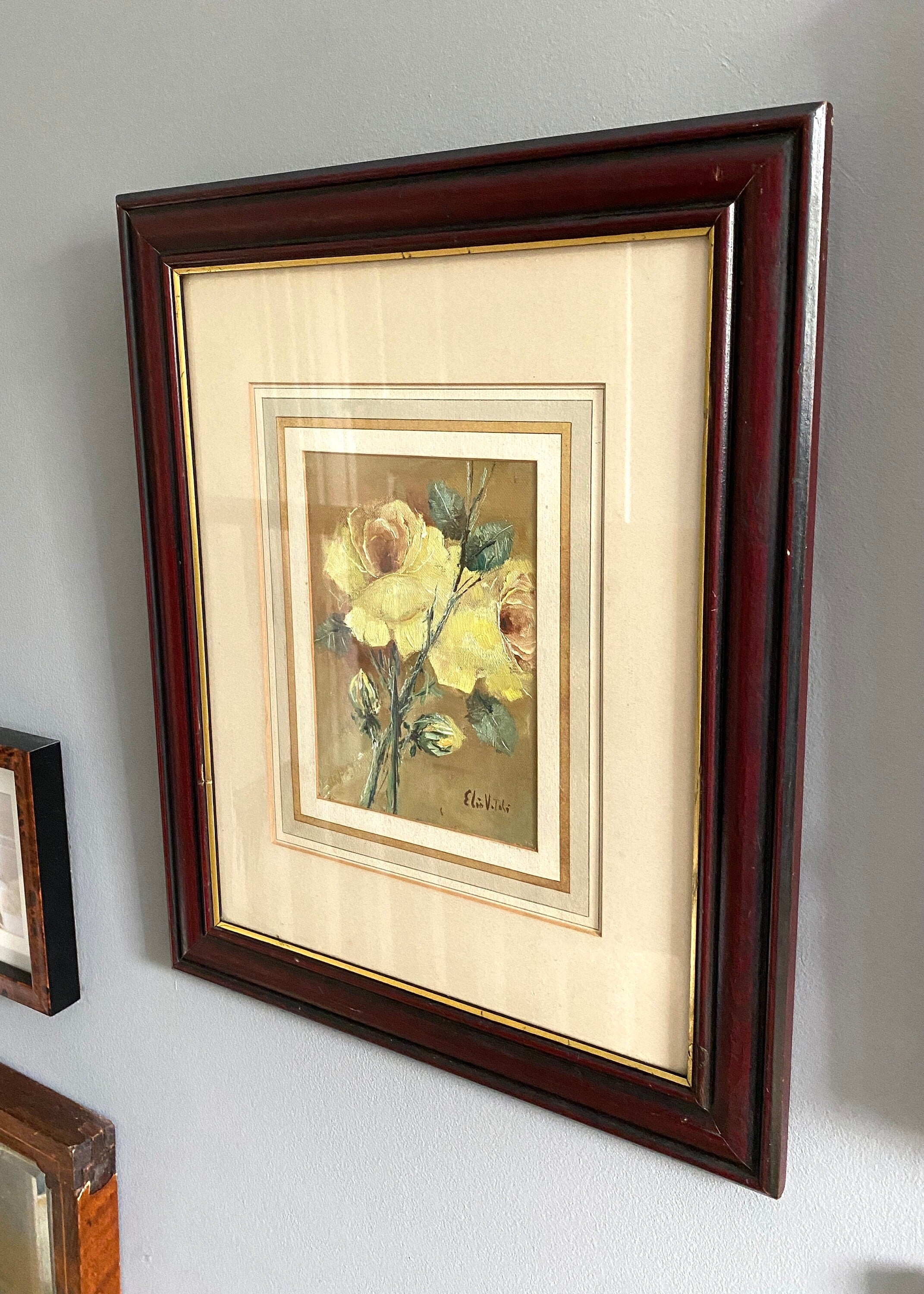Framed painting of yellow flowers