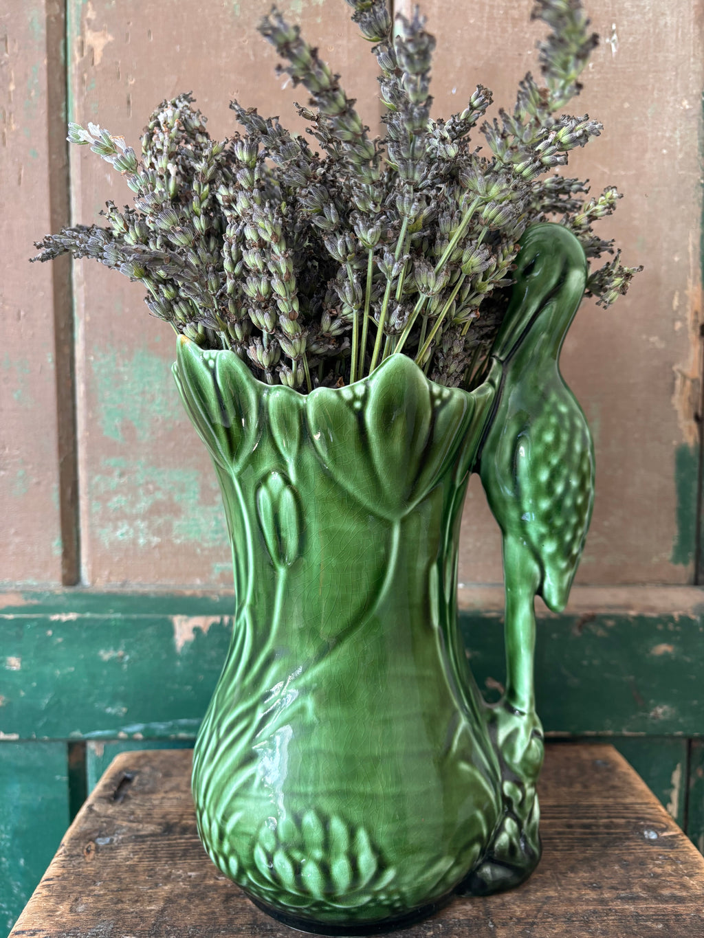 A Sylvac green ceramic heron vase.