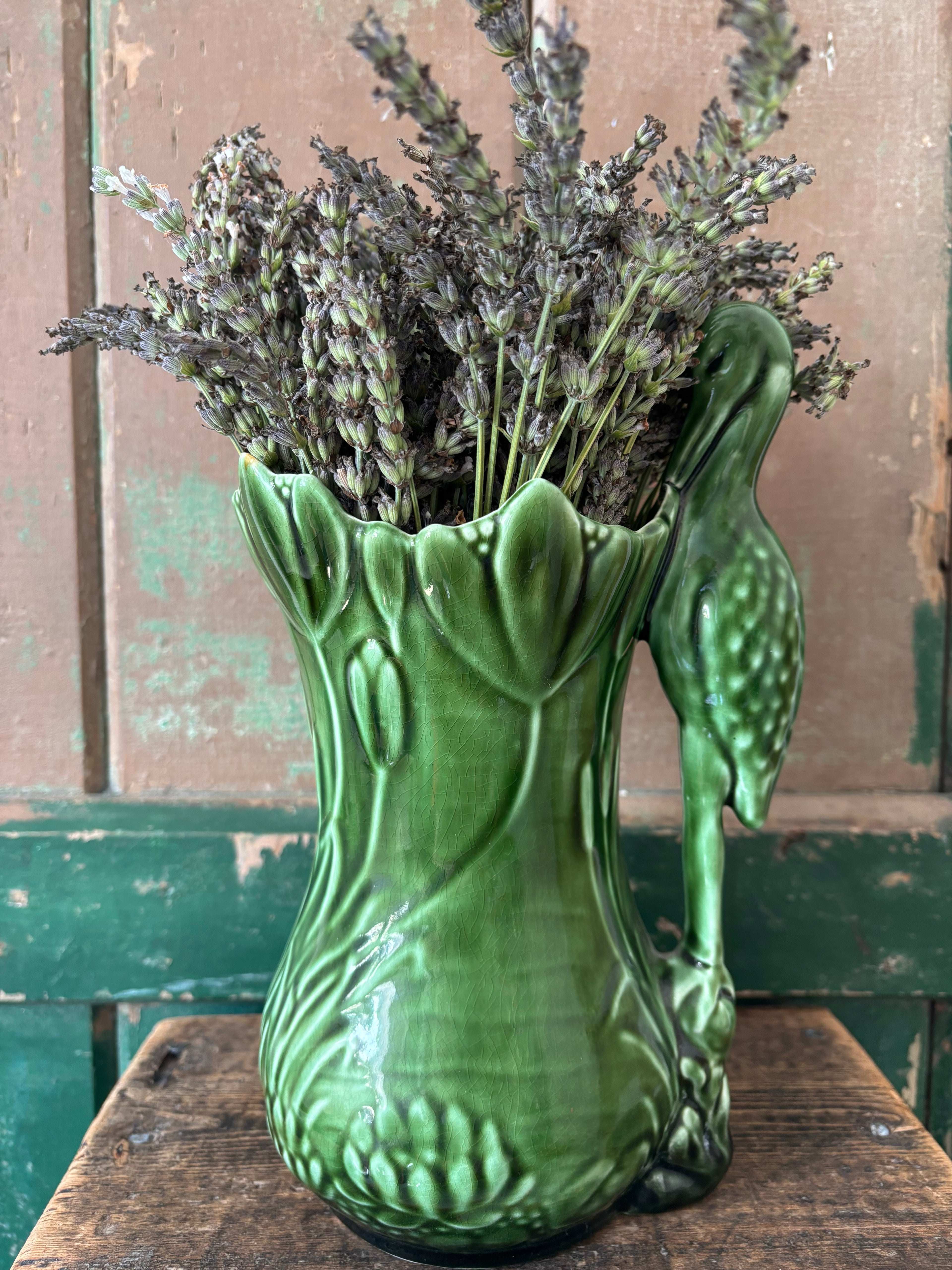 A Sylvac green ceramic heron vase.