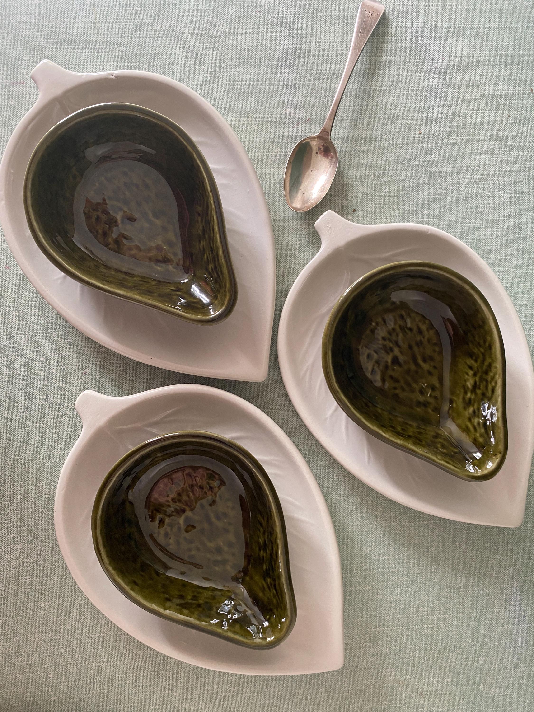 Three ceramic avocado shaped dishes