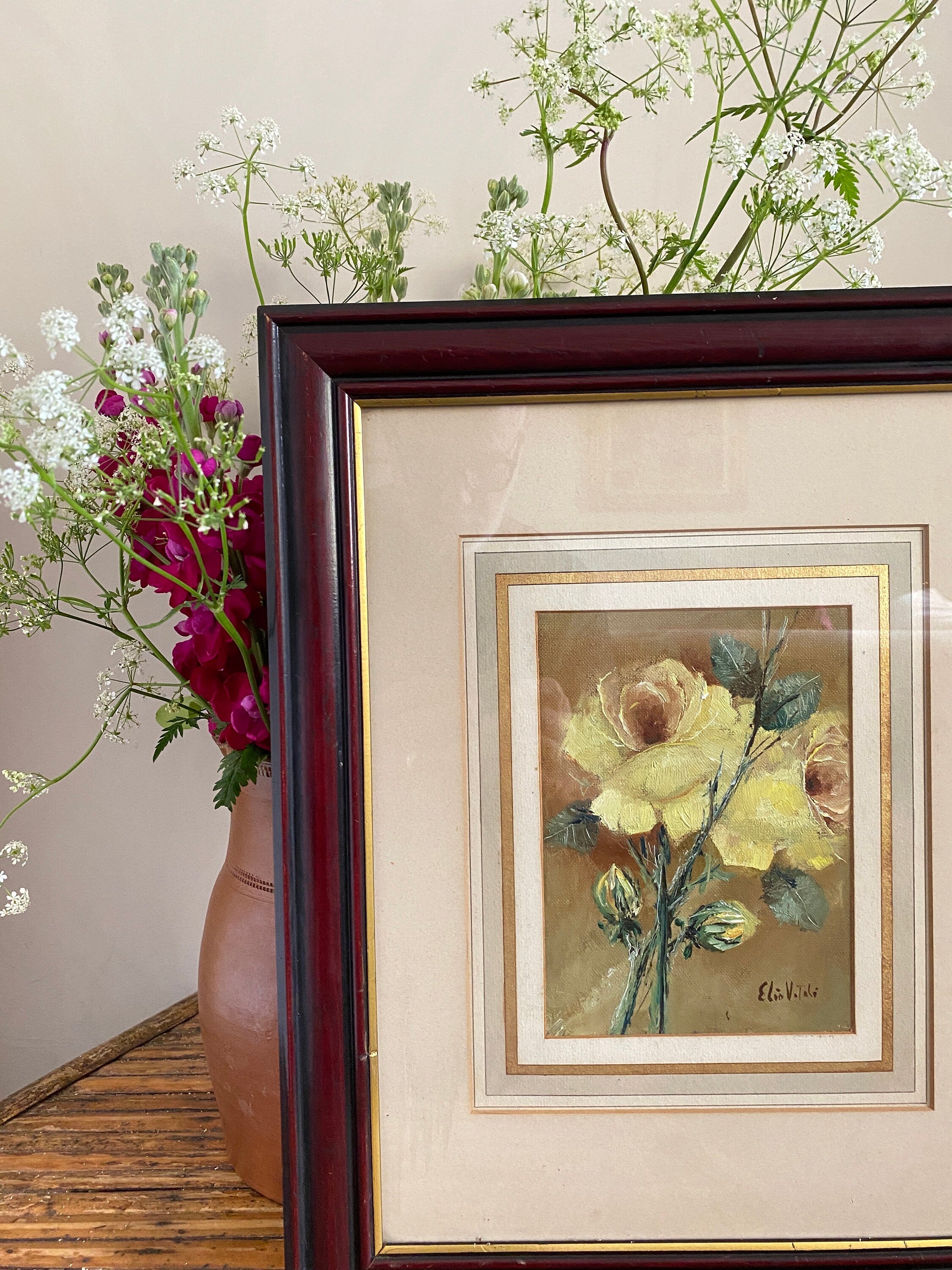 Framed painting of yellow flowers