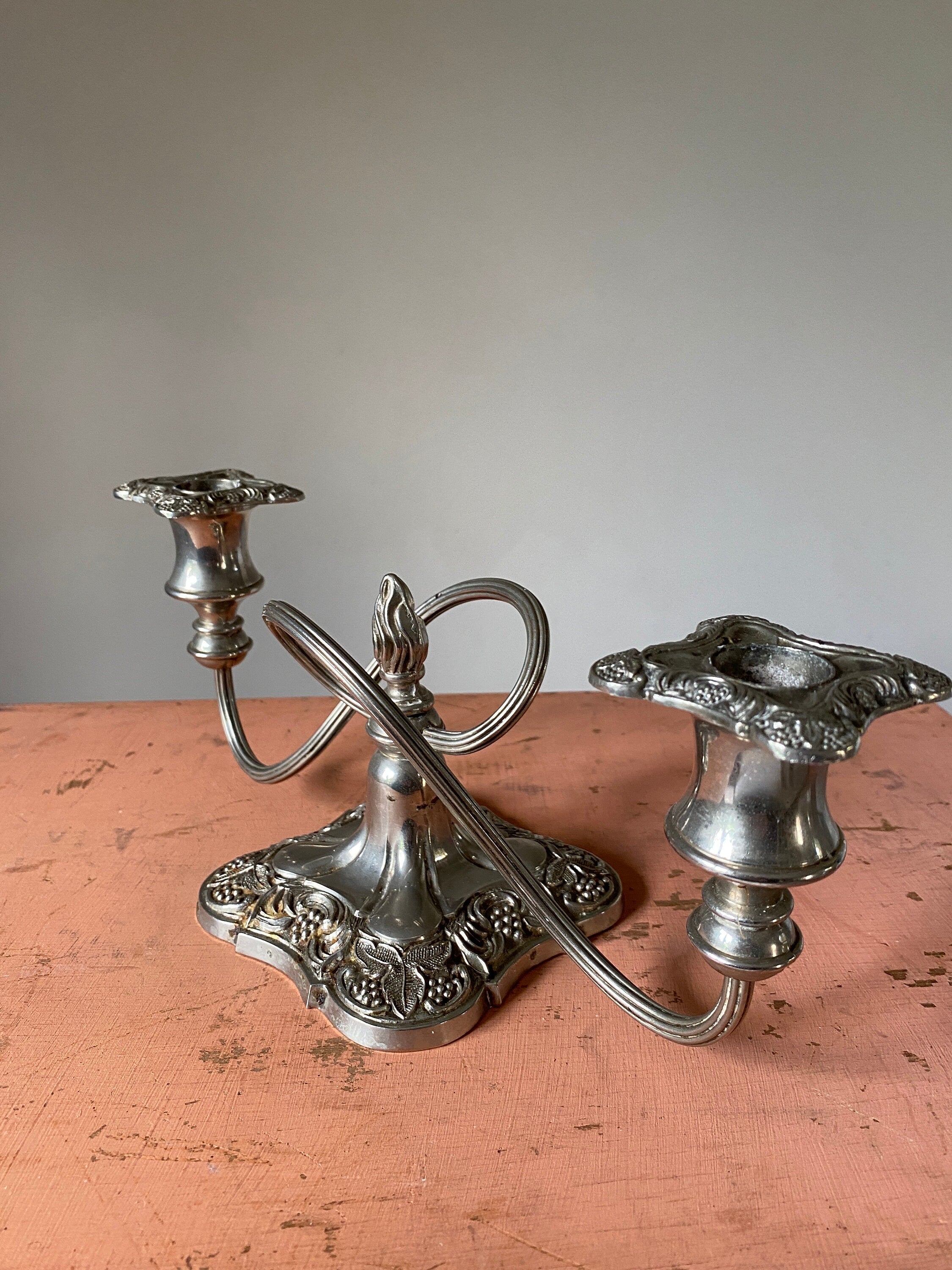 Vintage silver double candelabra with ornate square base