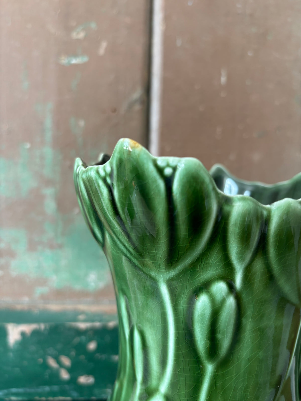 Close up of rim of sylvac heron vase.