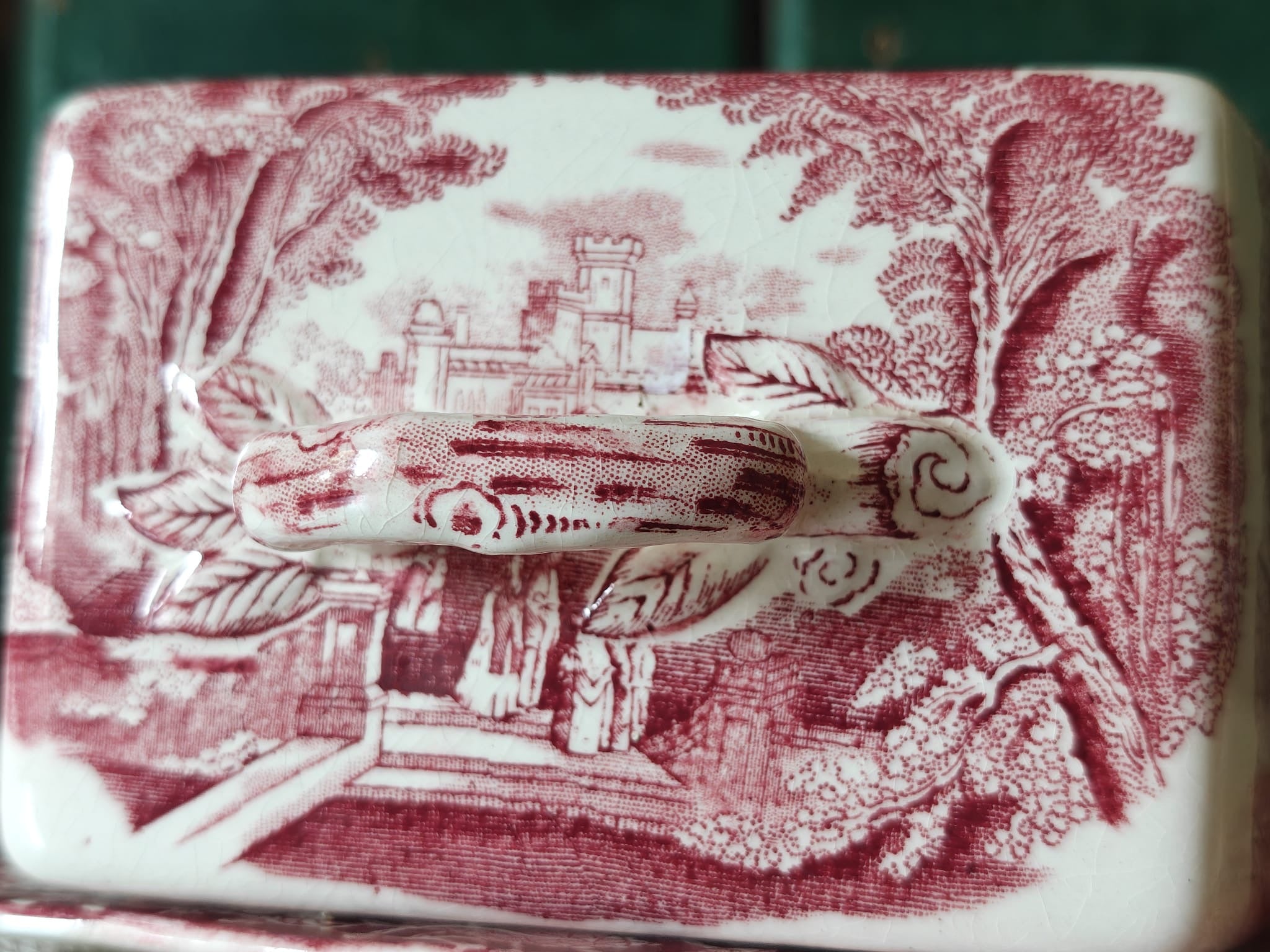A close-up of a ceramic lid of a Masons Vista butter dish.