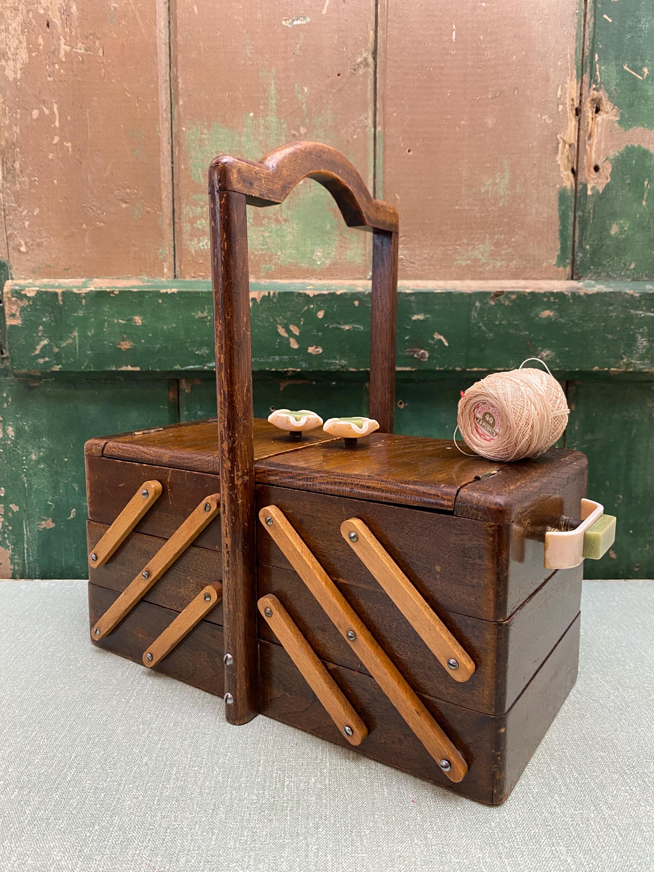 Vintage brown wooden sewing box with handles