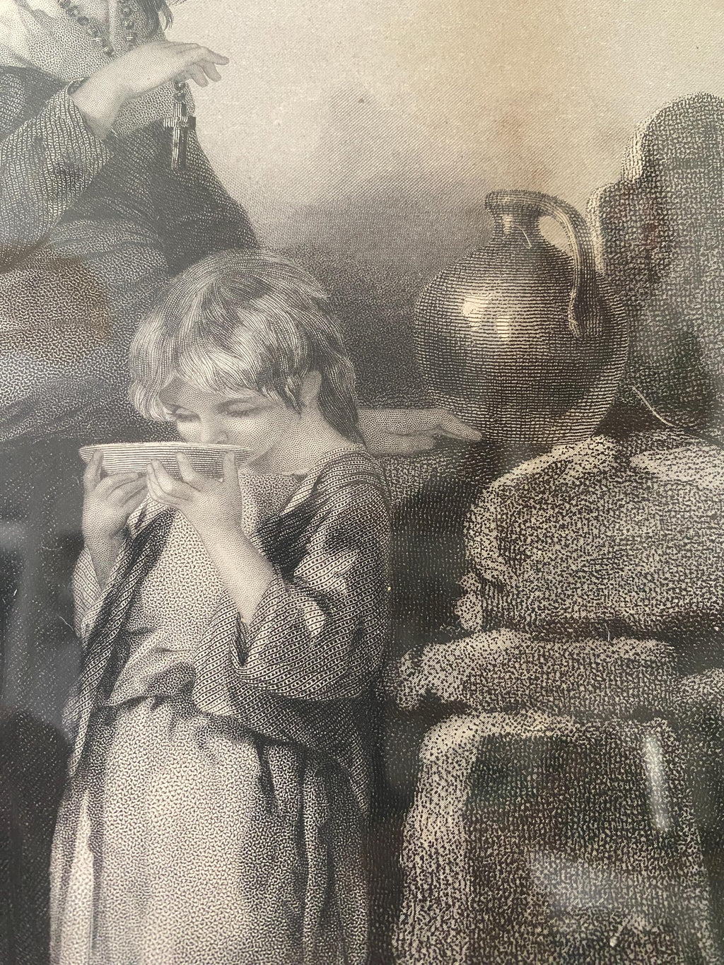 Black and white illustration of a child drinking from a cup