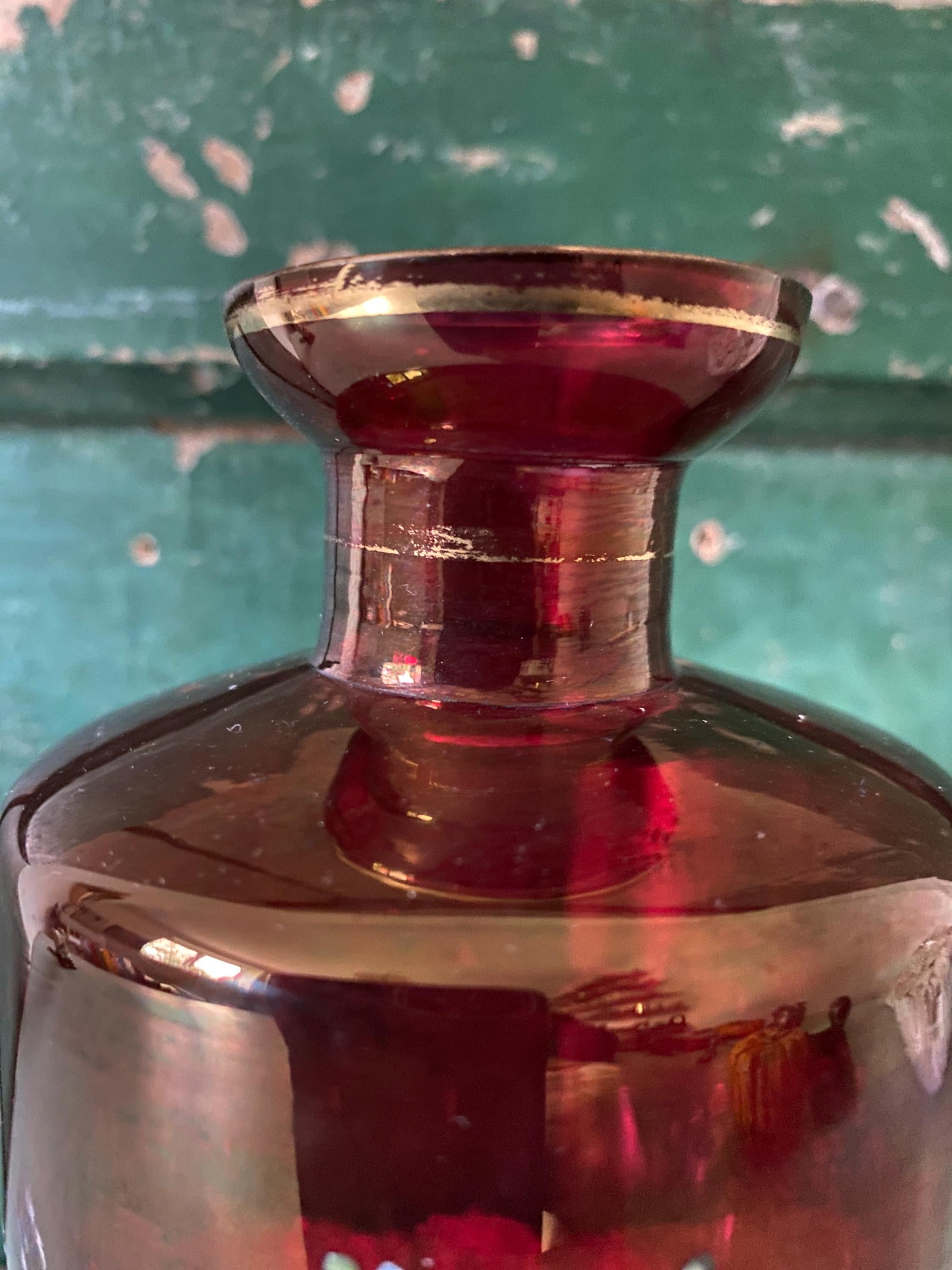 Close-up of a red glass decanter