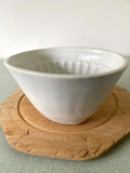A white ceramic vintage jelly mould