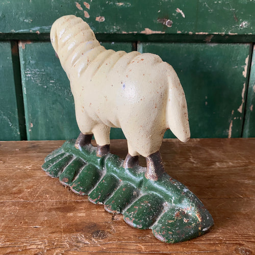 Cast iron doorstop showing part of a sheep