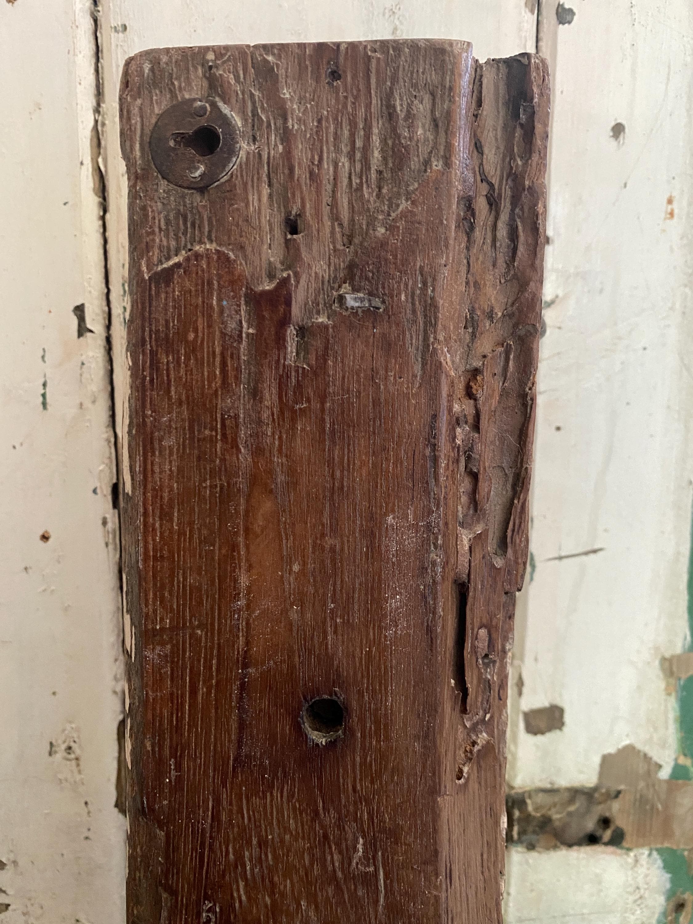 Rustic wooden block with a metal  keyhole