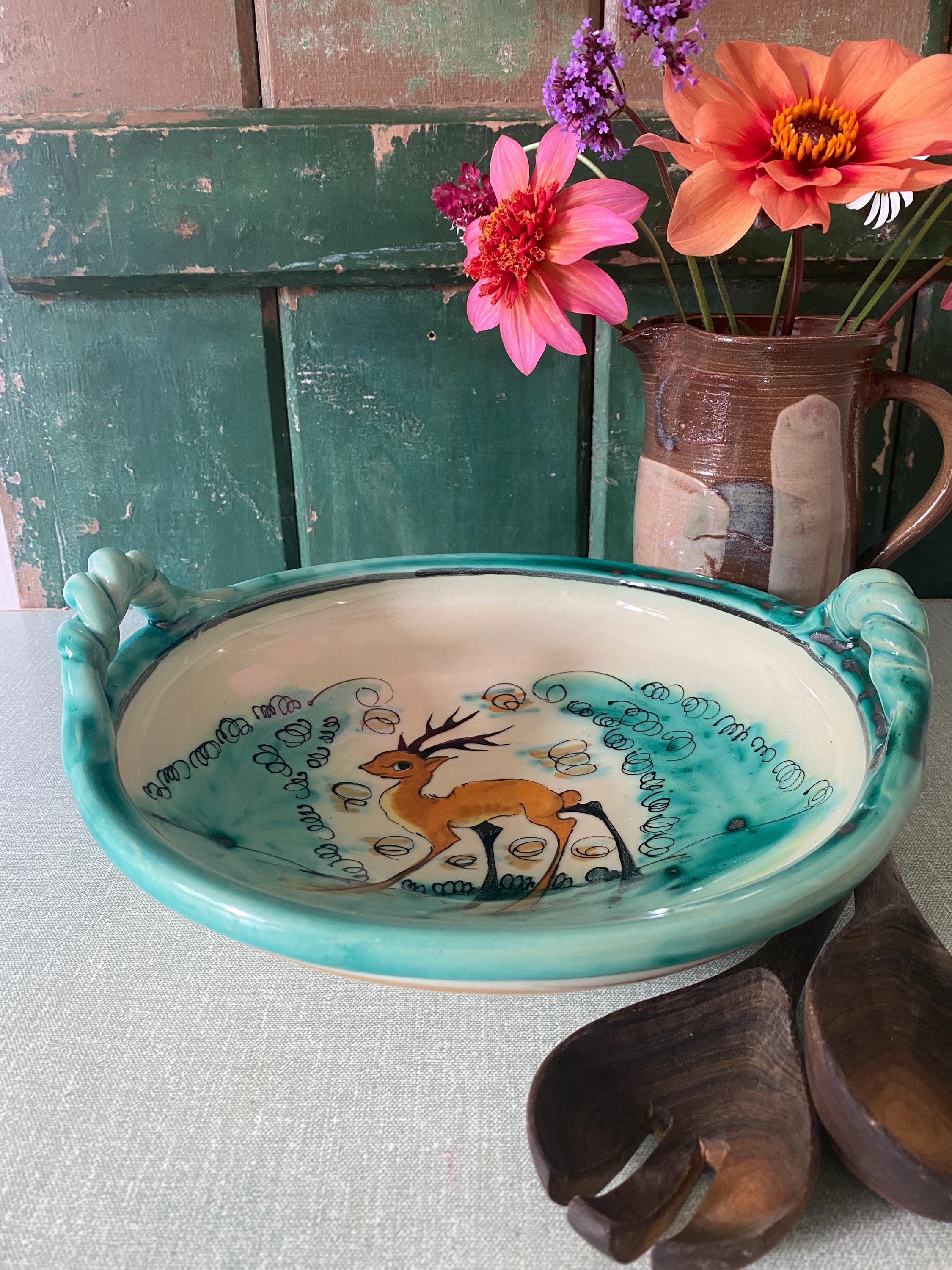 Decorative ceramic bowl with deer design 