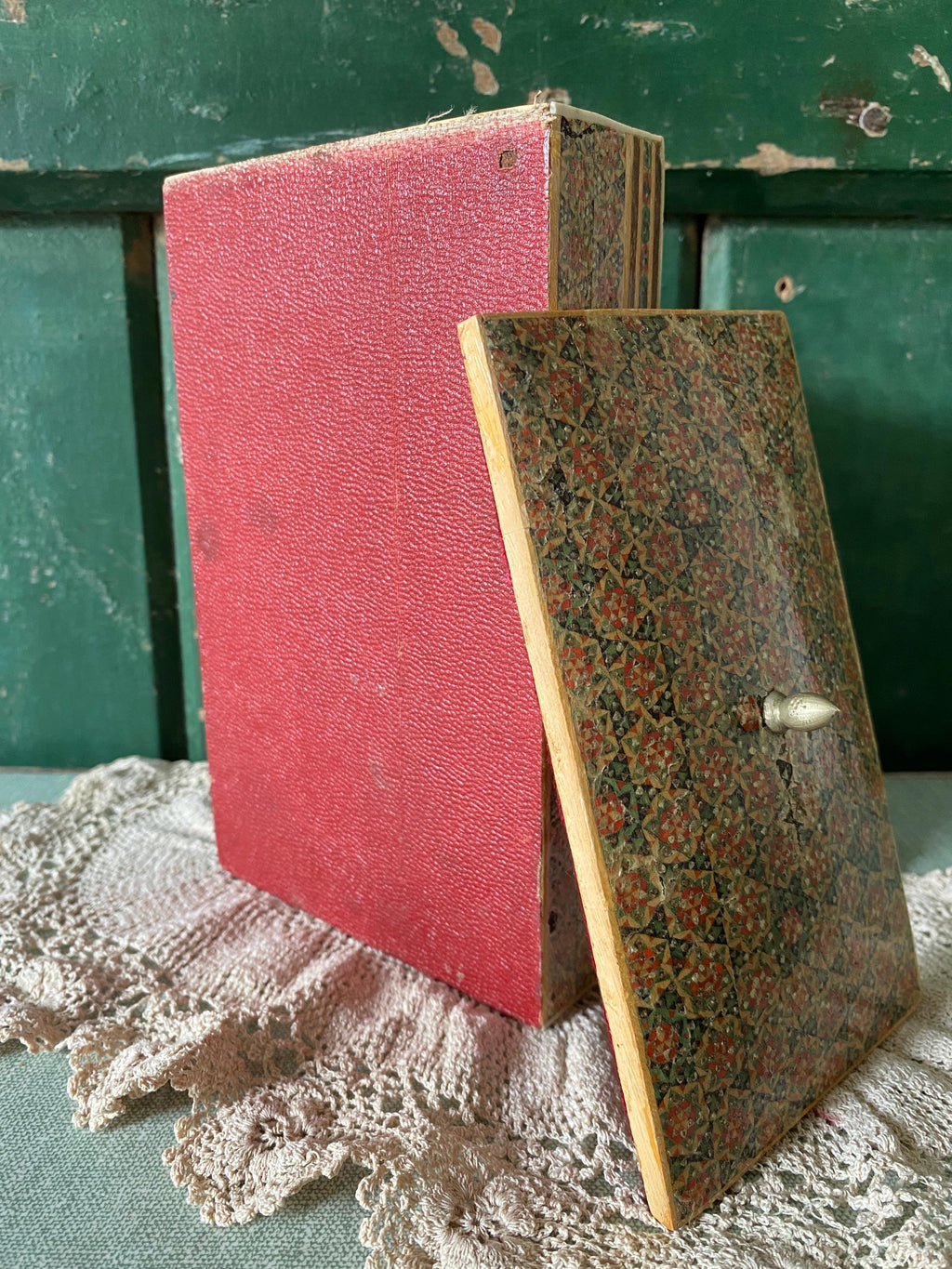 Underside of decorative wooden box with lid
