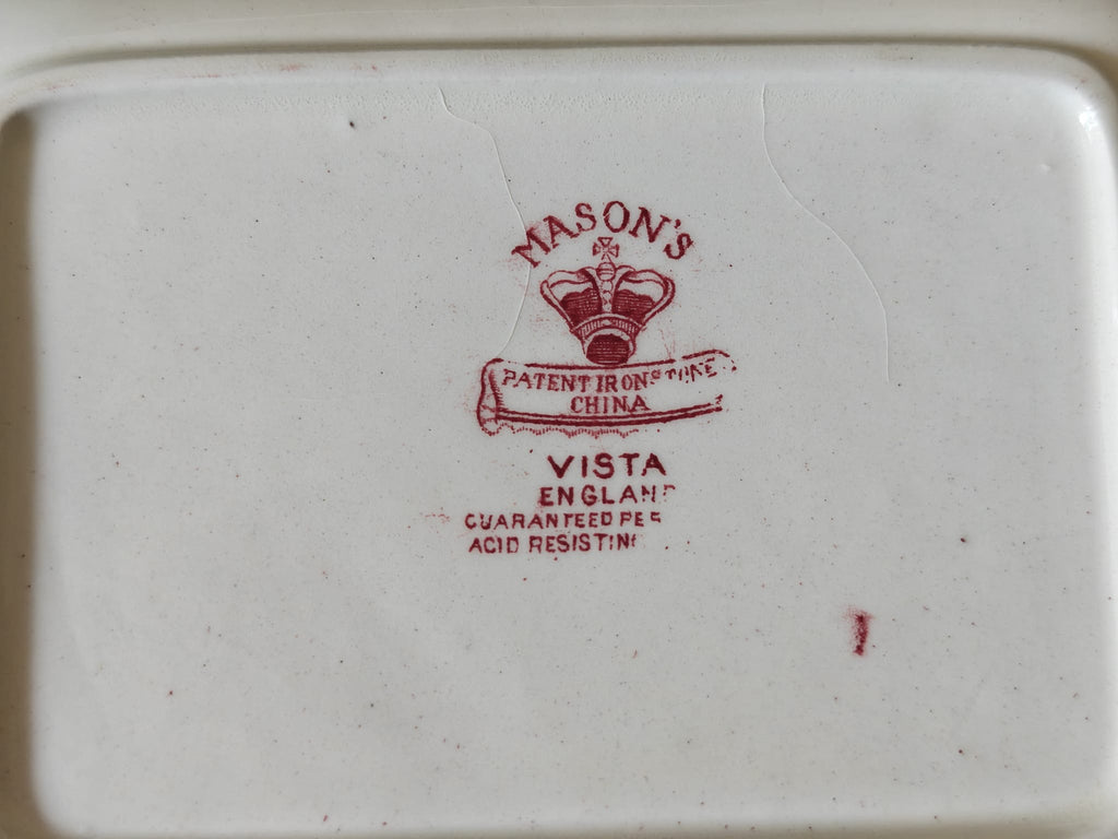 The bottom of a white ceramic plate or dish with a red printed Mason's Vista England logo and text.