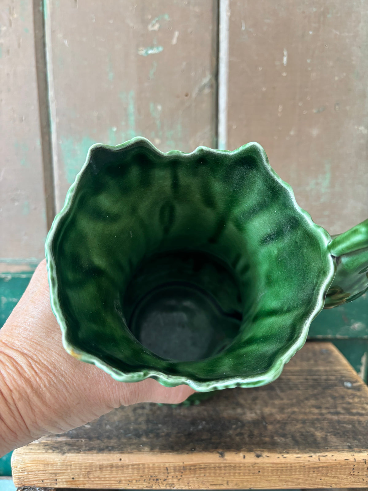 Interior of sylvac heron vase in dark green.