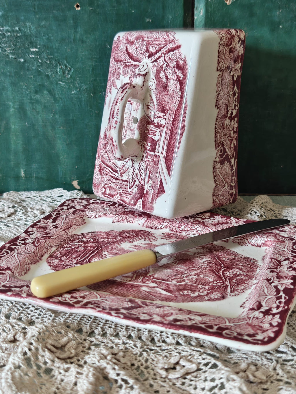A Masons Pink Vista ceramic butter dish.