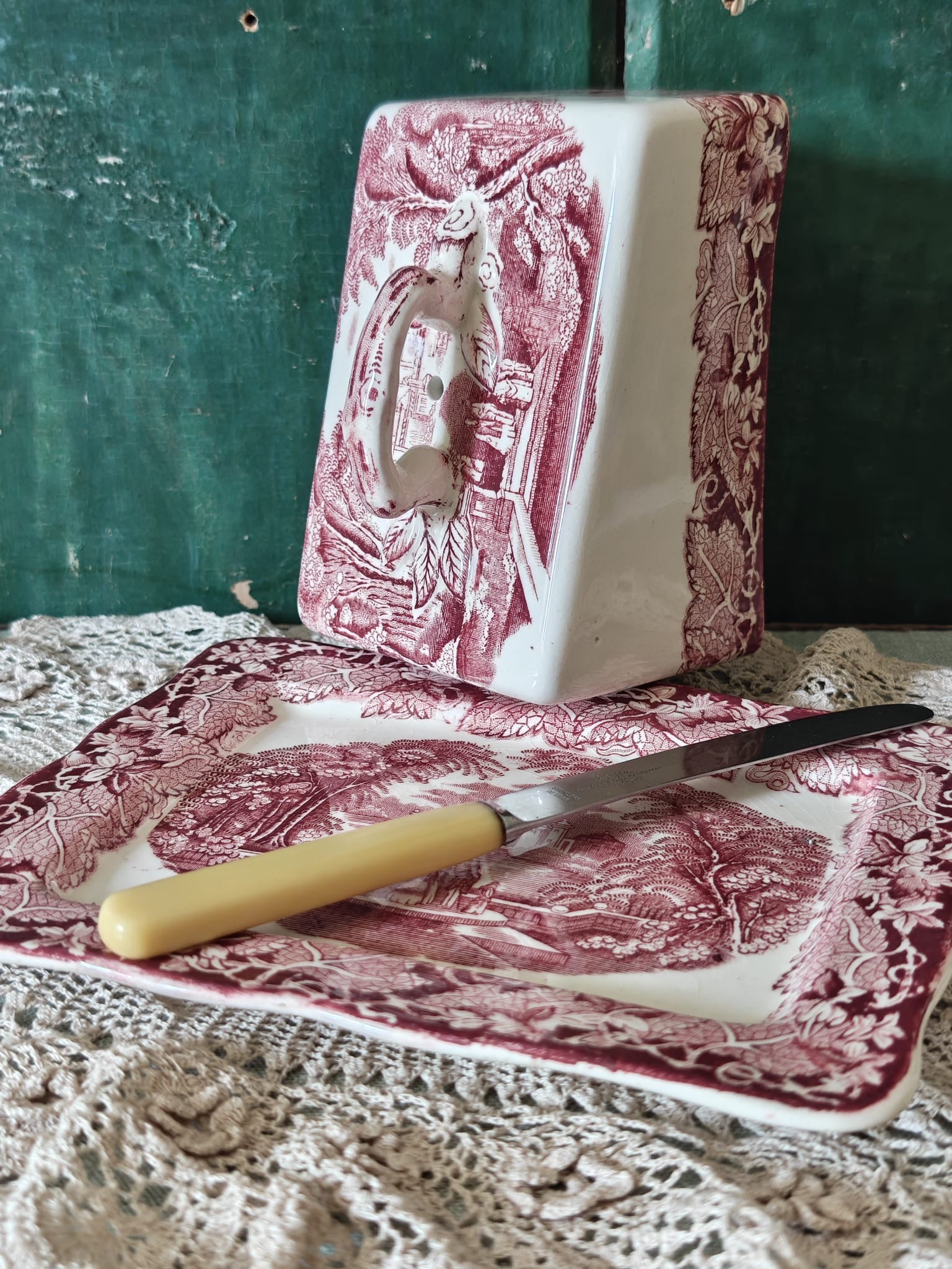 A Masons Pink Vista ceramic butter dish.