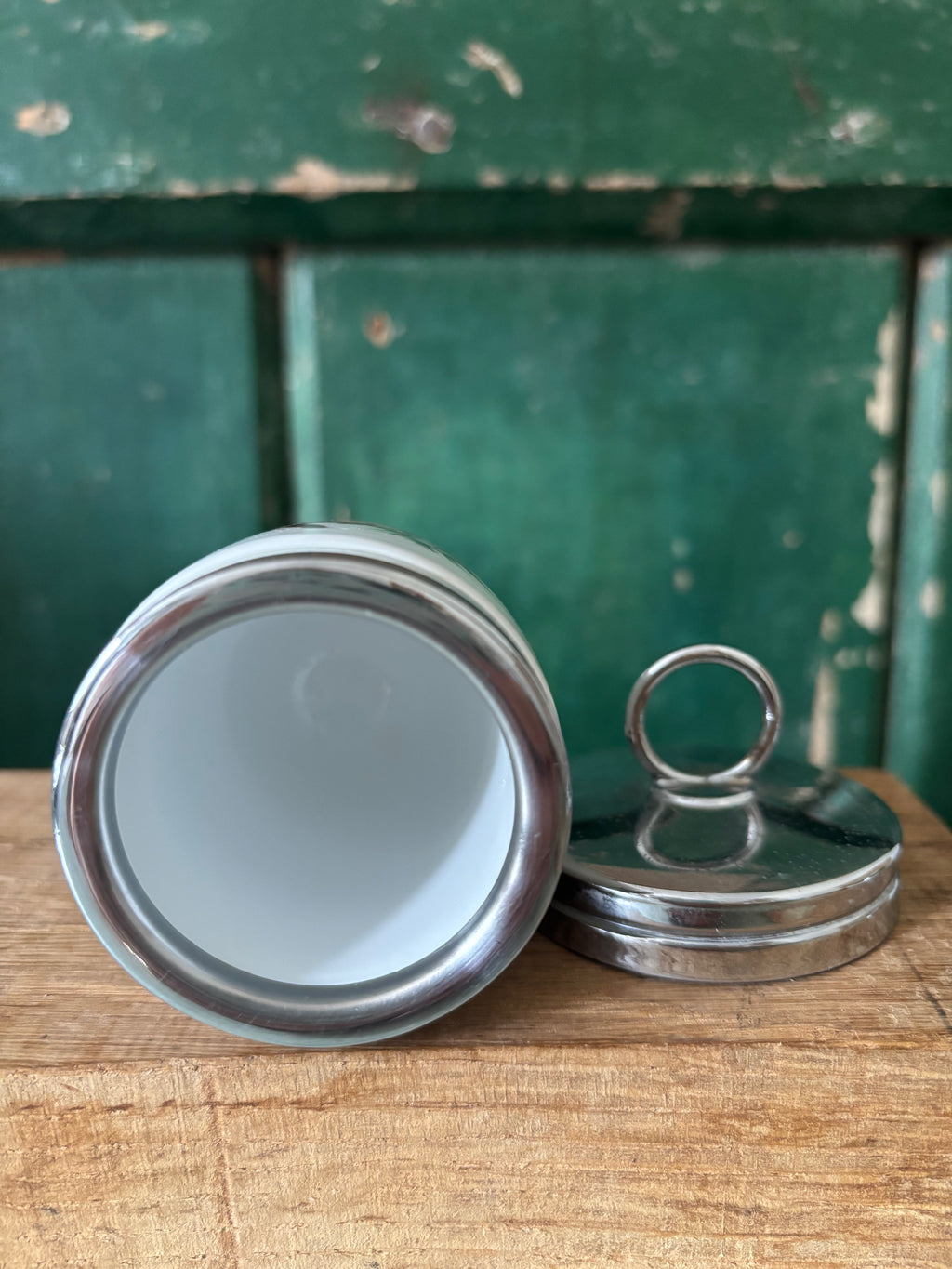 The interior of a vintage egg coddler.