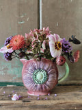 A purple floral jug