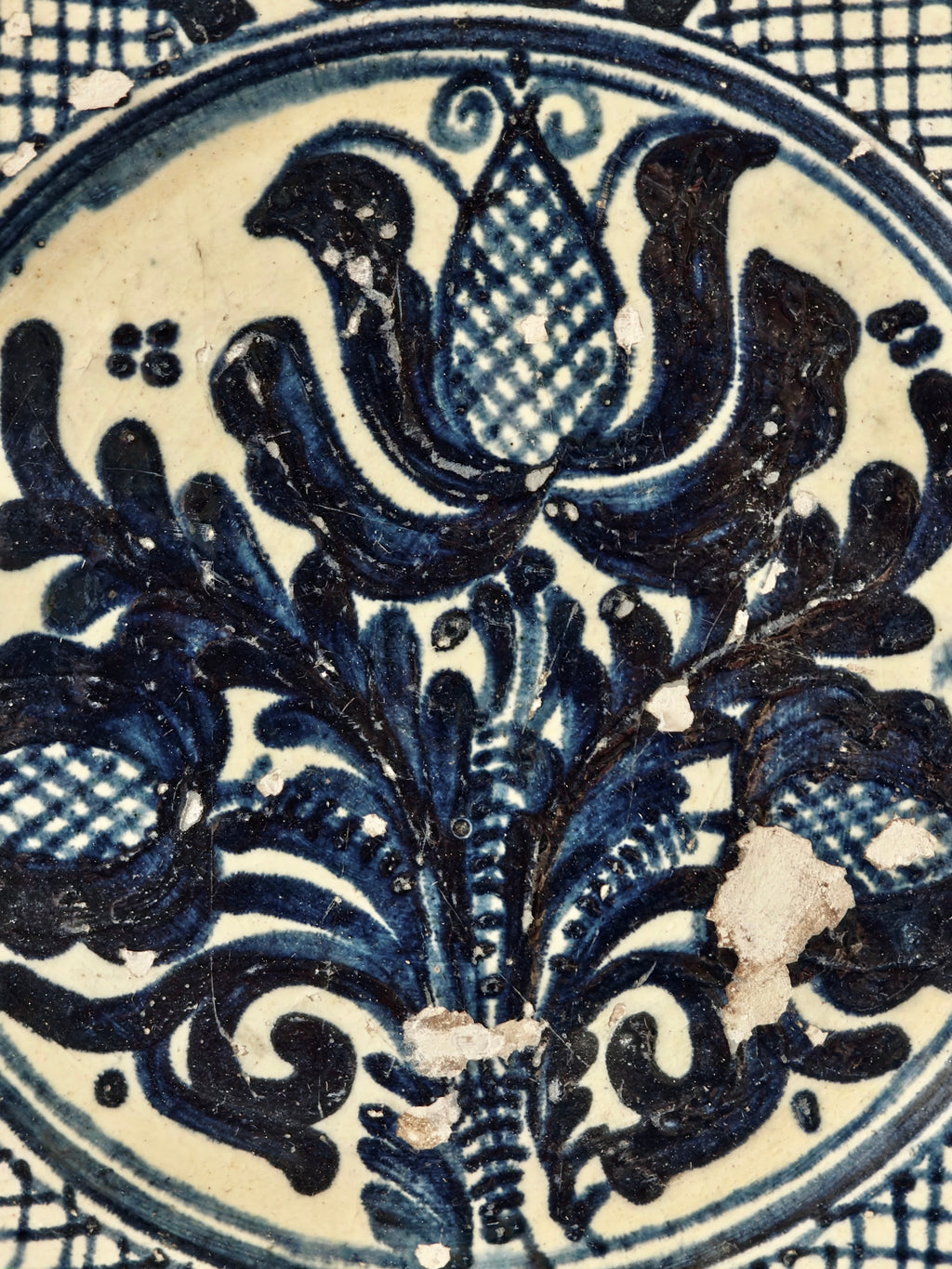 Close up of blue and white decorative ceramic plate