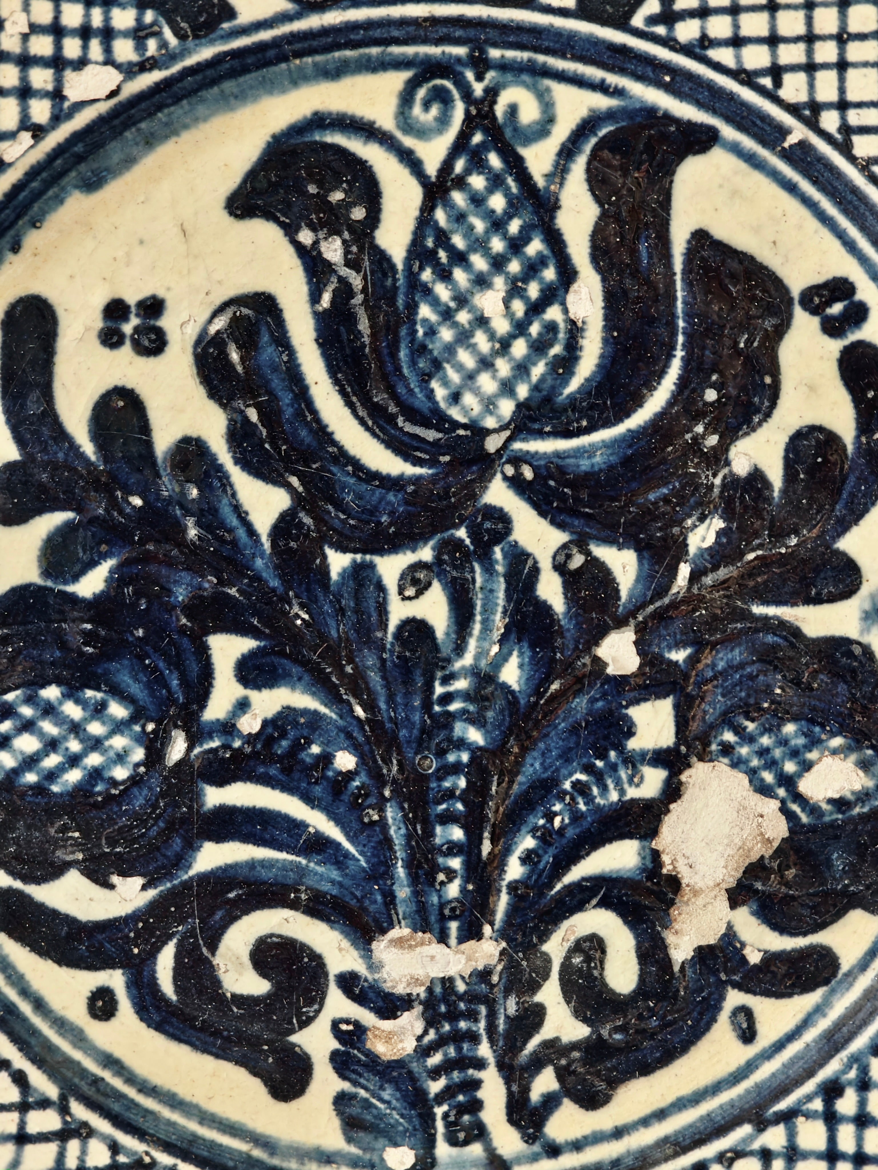 Close up of blue and white decorative ceramic plate