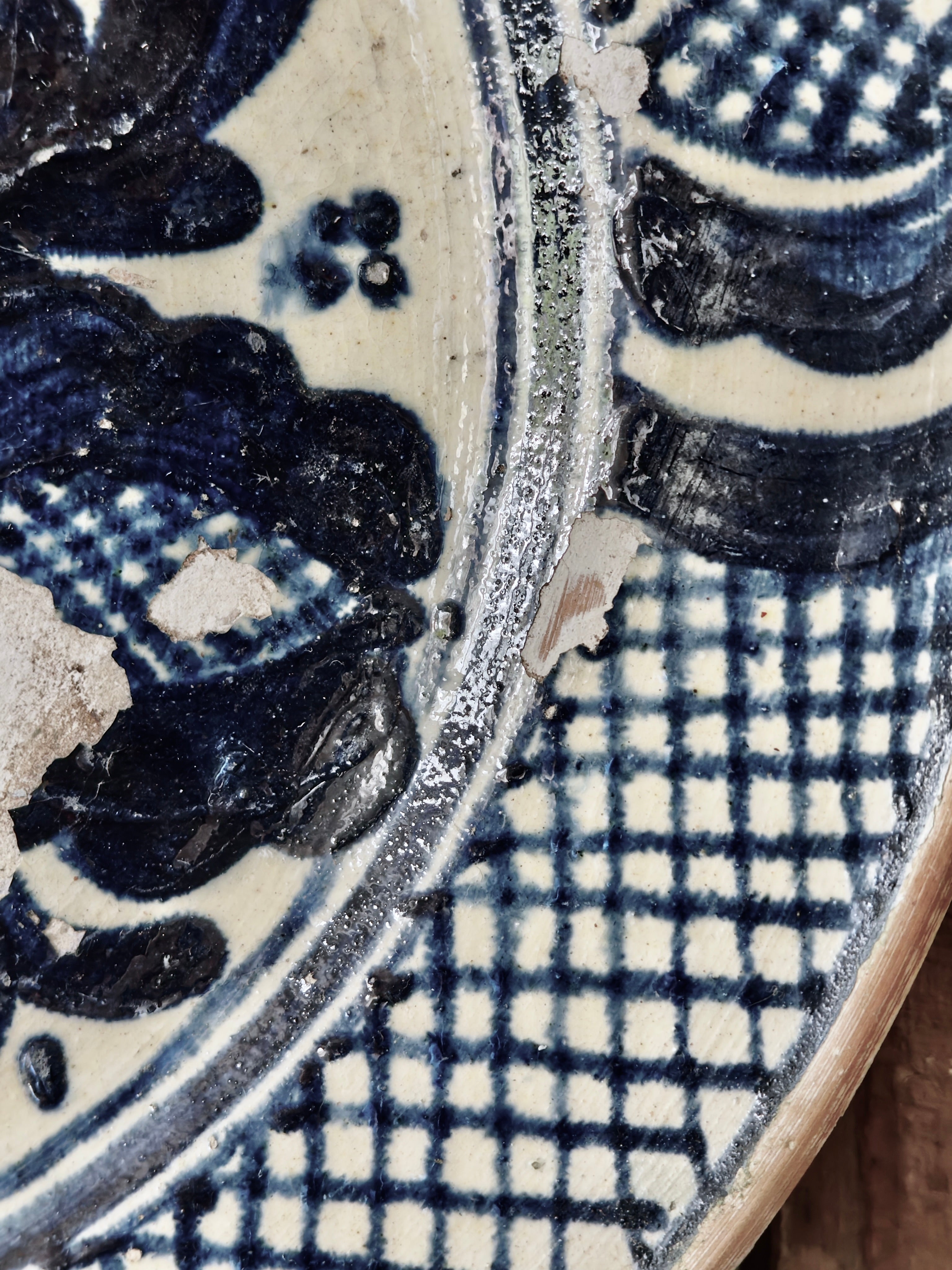 Close-up of a blue and white ceramic plate with blue and white patterns