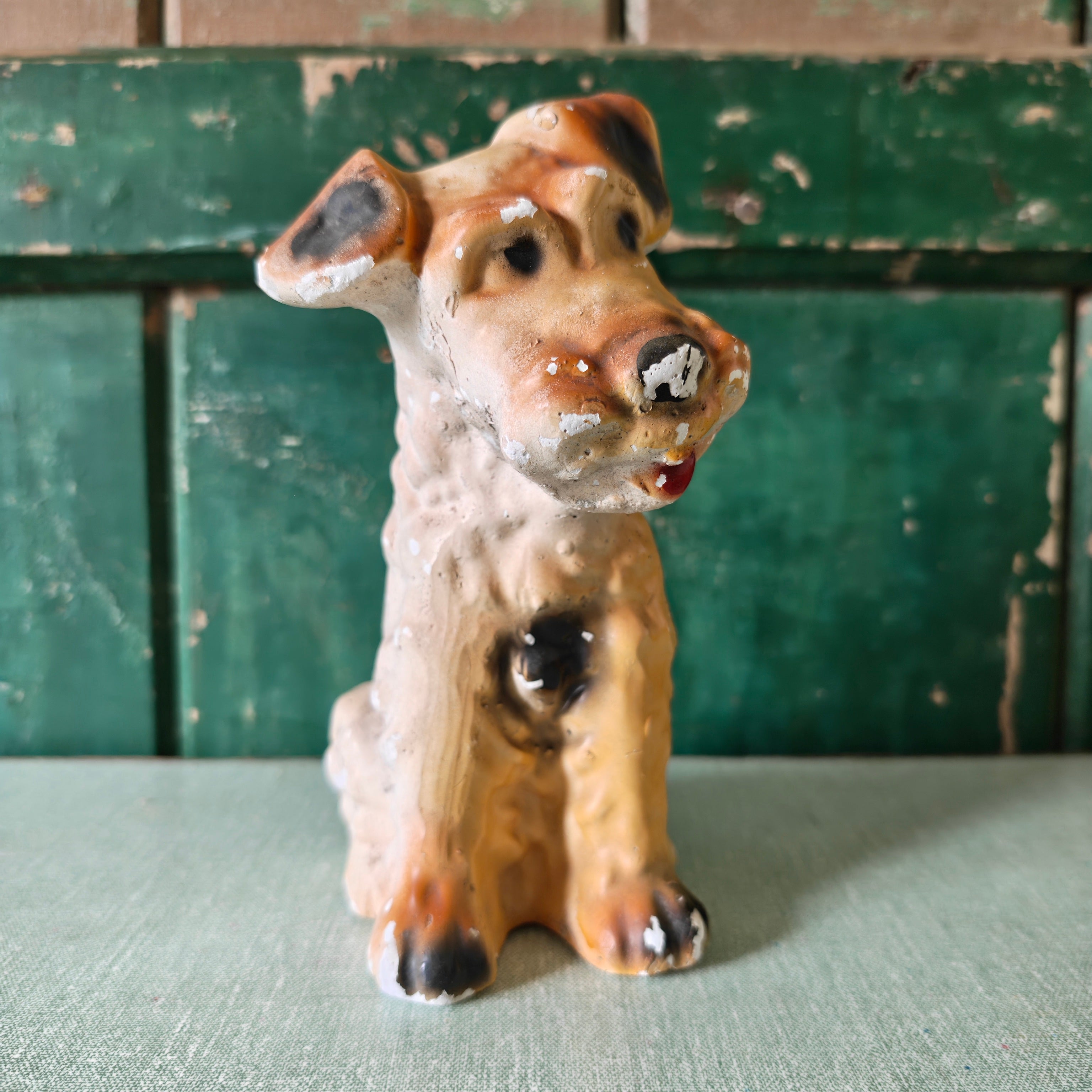 Vintage chalkware sculpture of a terrier