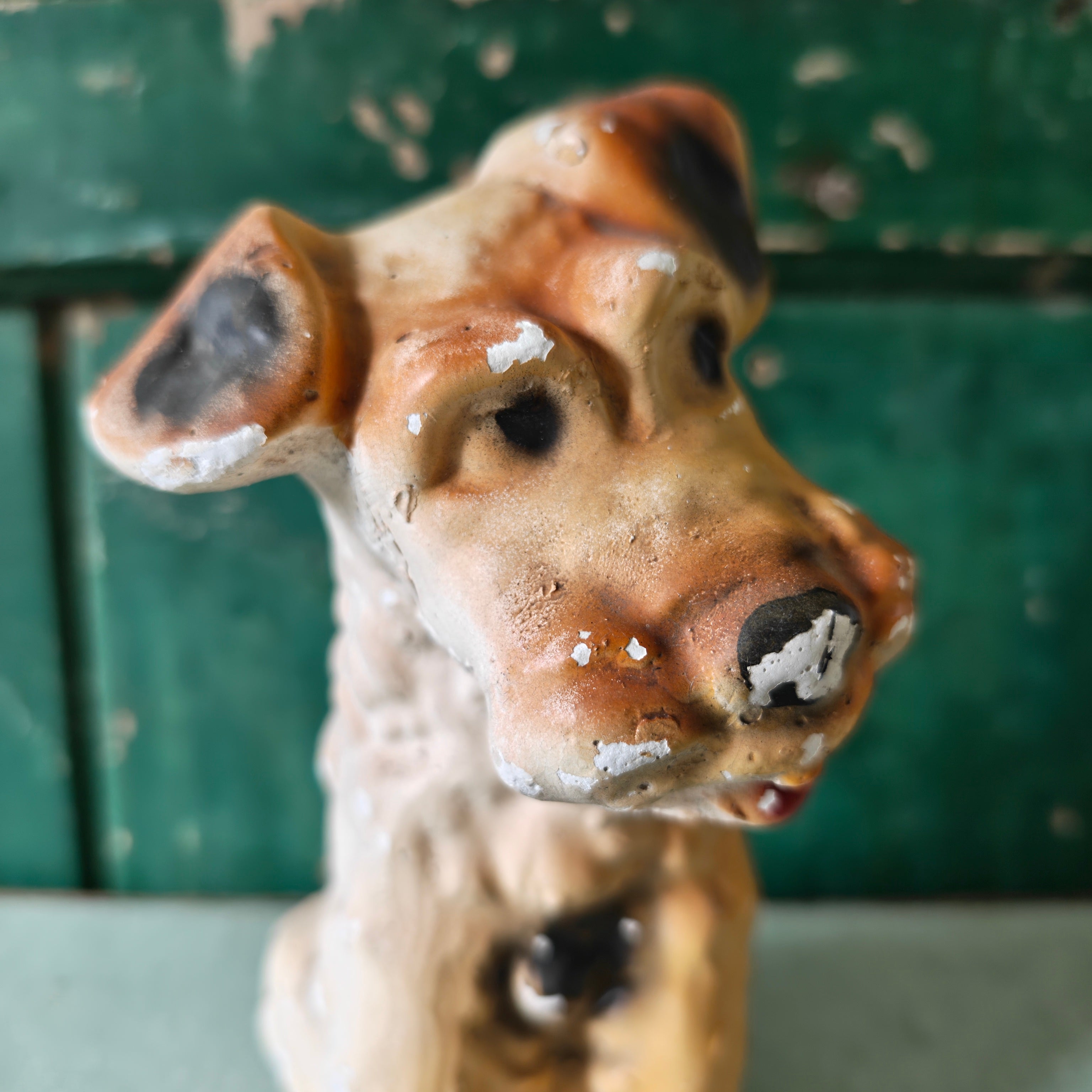 Close-up of a plaster dog figurine 