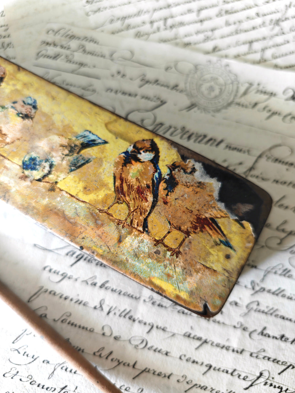 Close-up of birds decoration on box lid