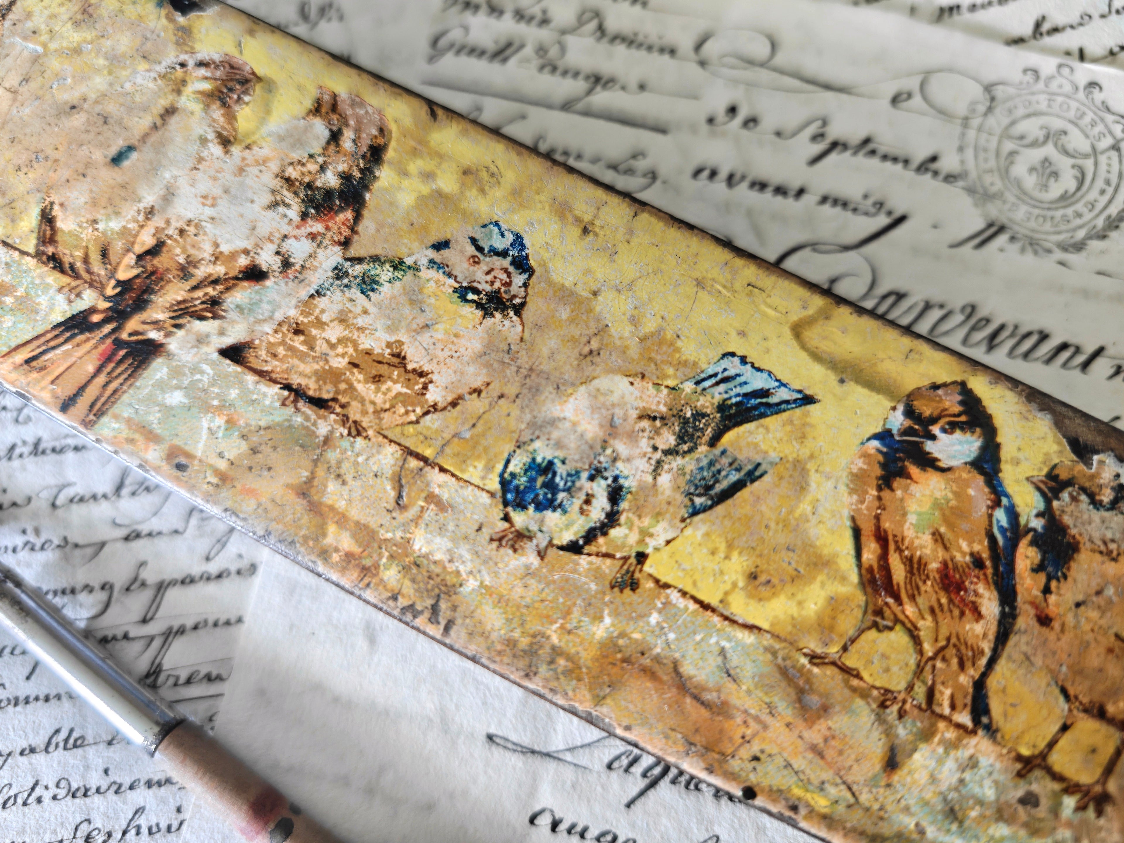 Close-up of birds decoration on box lid