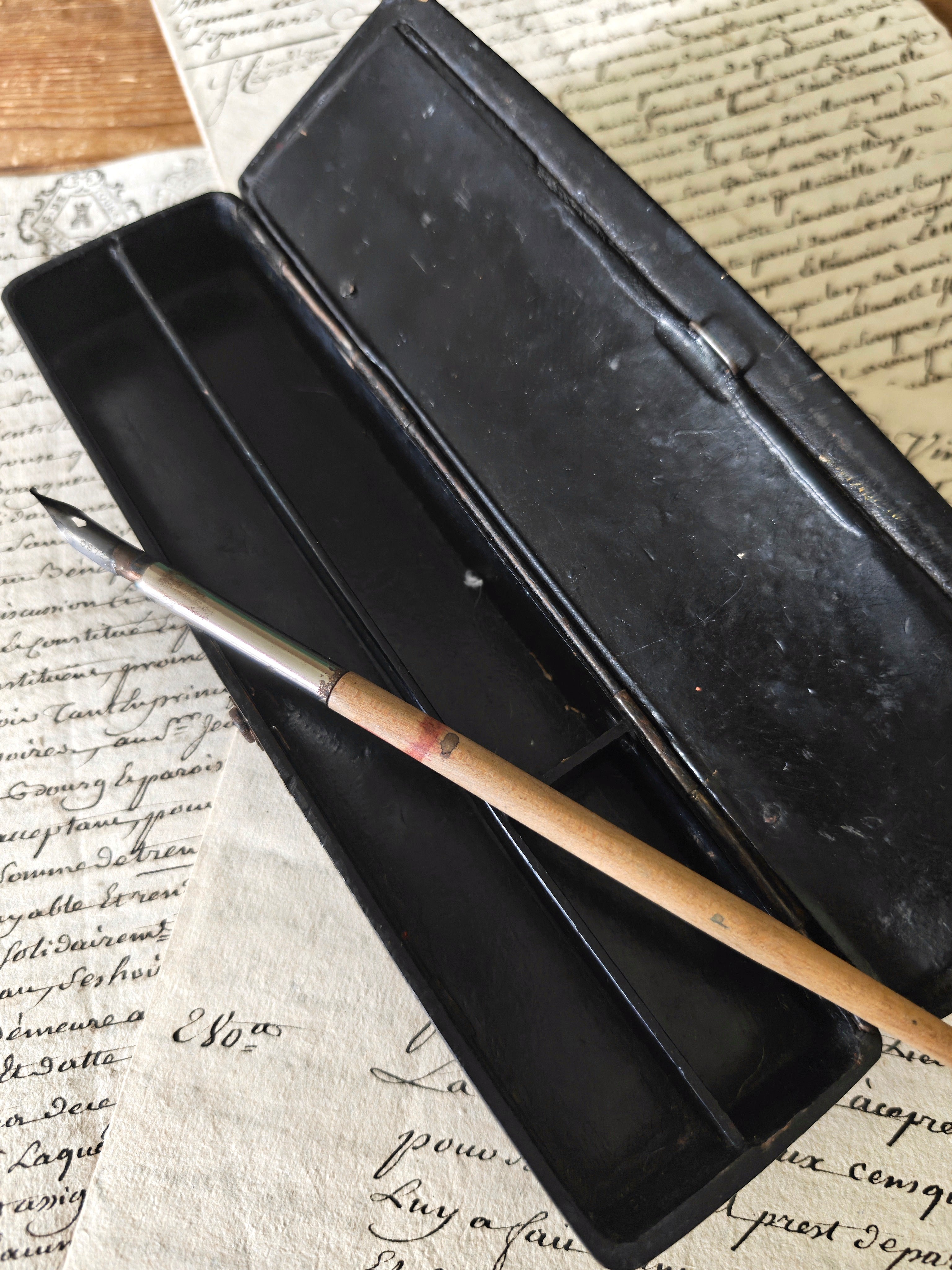 Inside of a pen storage box with pen