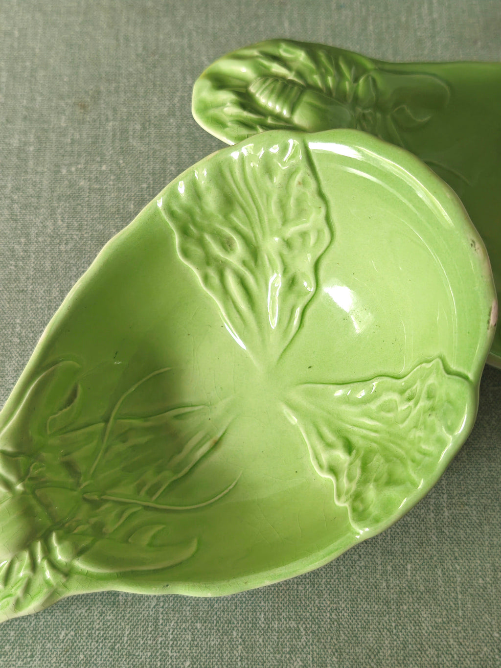 Green ceramic dish with leaf decoration
