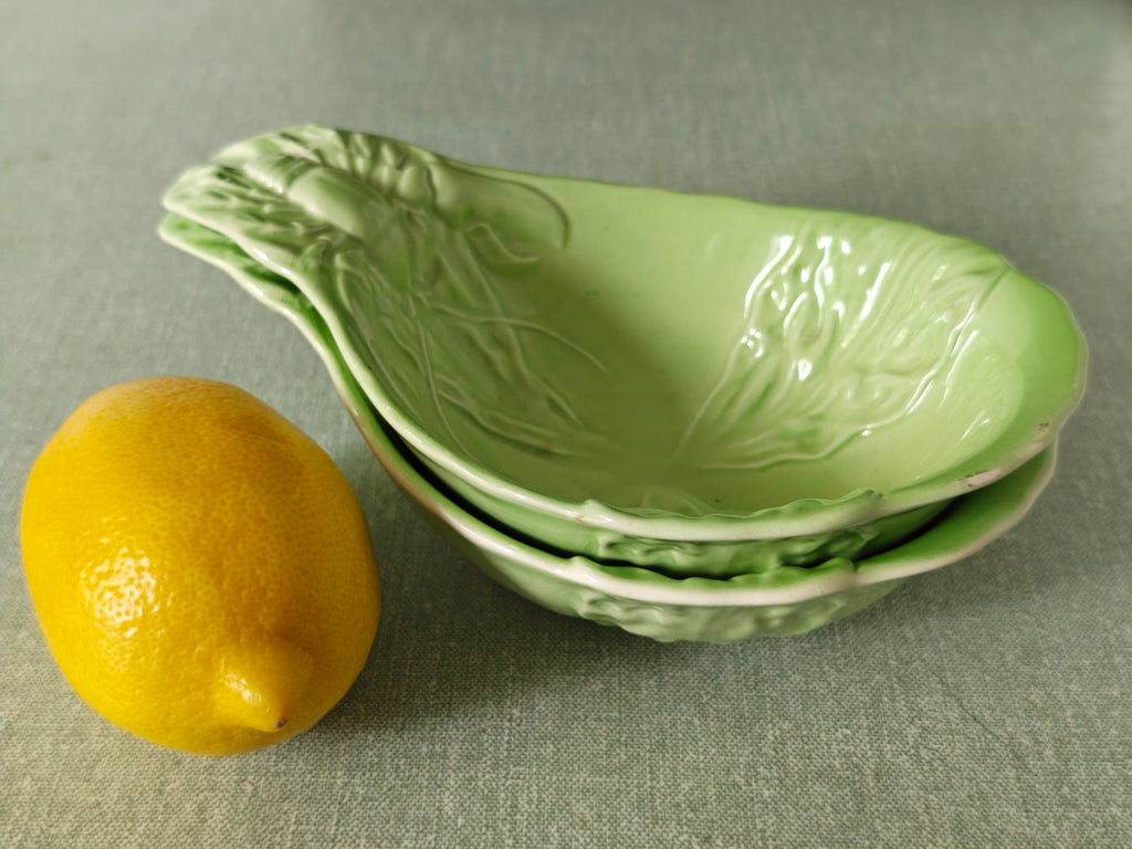 pair of green ceramic stacking 
bowls
