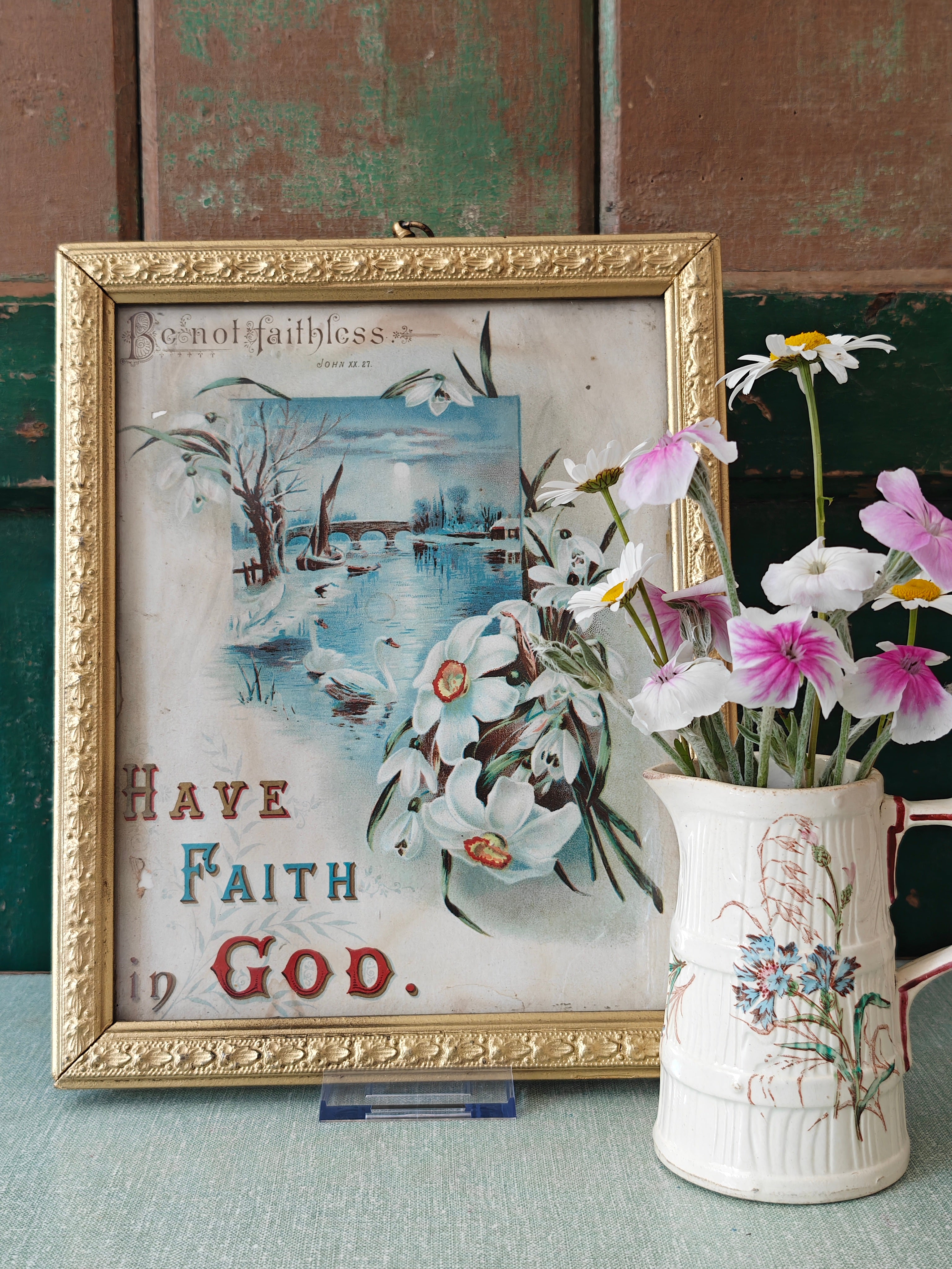 religious print in gold frame