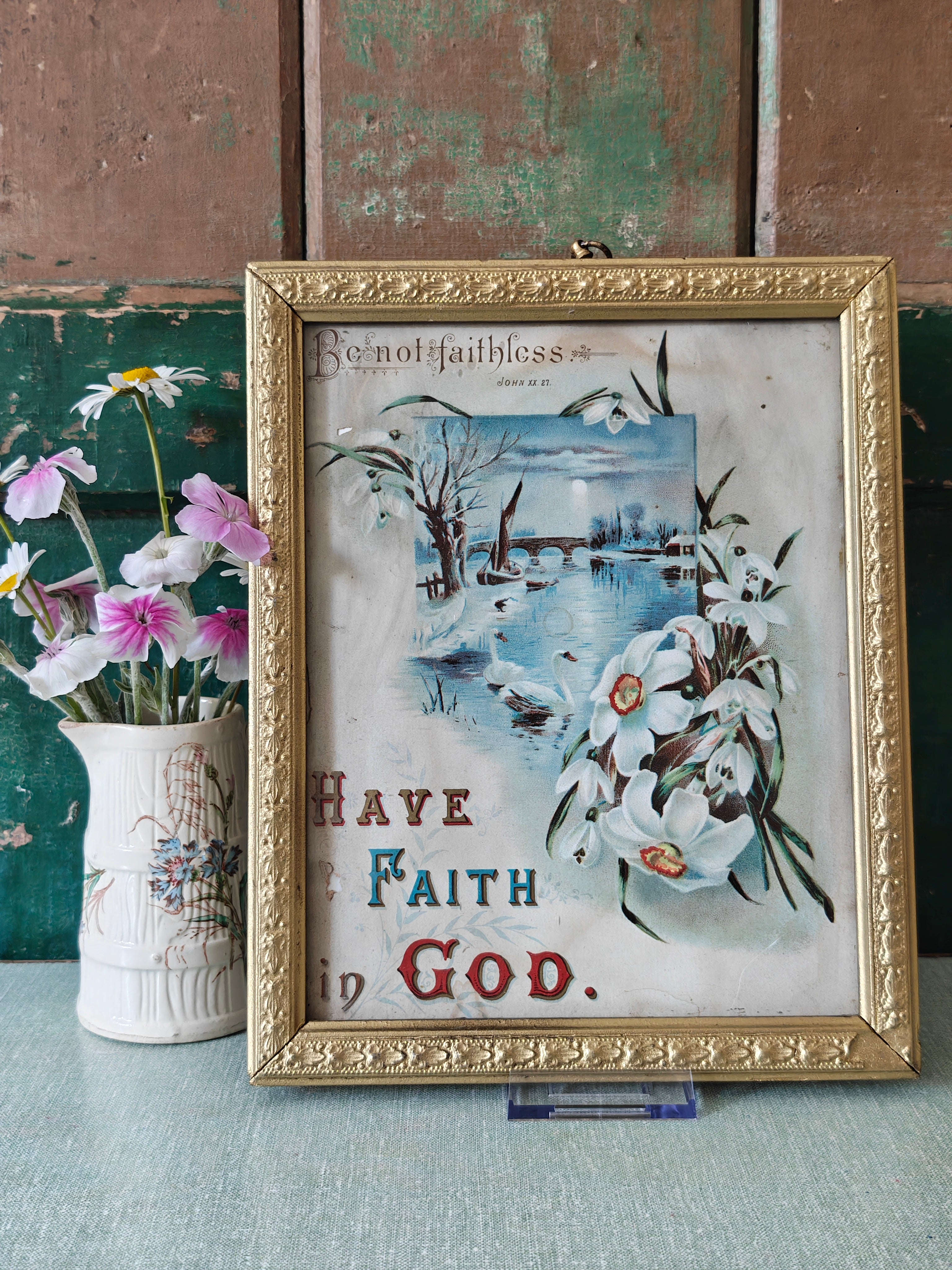 religious print in gold frame