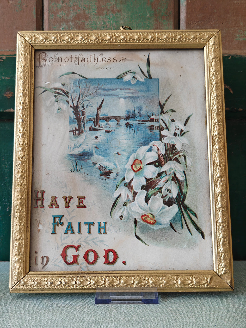 religious print in gold frame