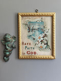 religious print in gold frame