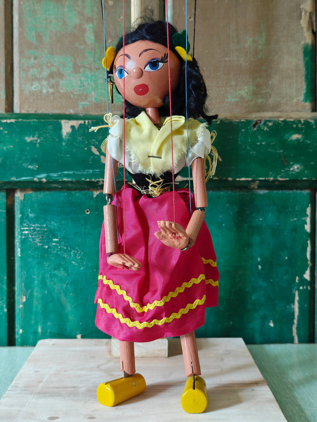 Traditional marionette puppet with a colorful outfit 