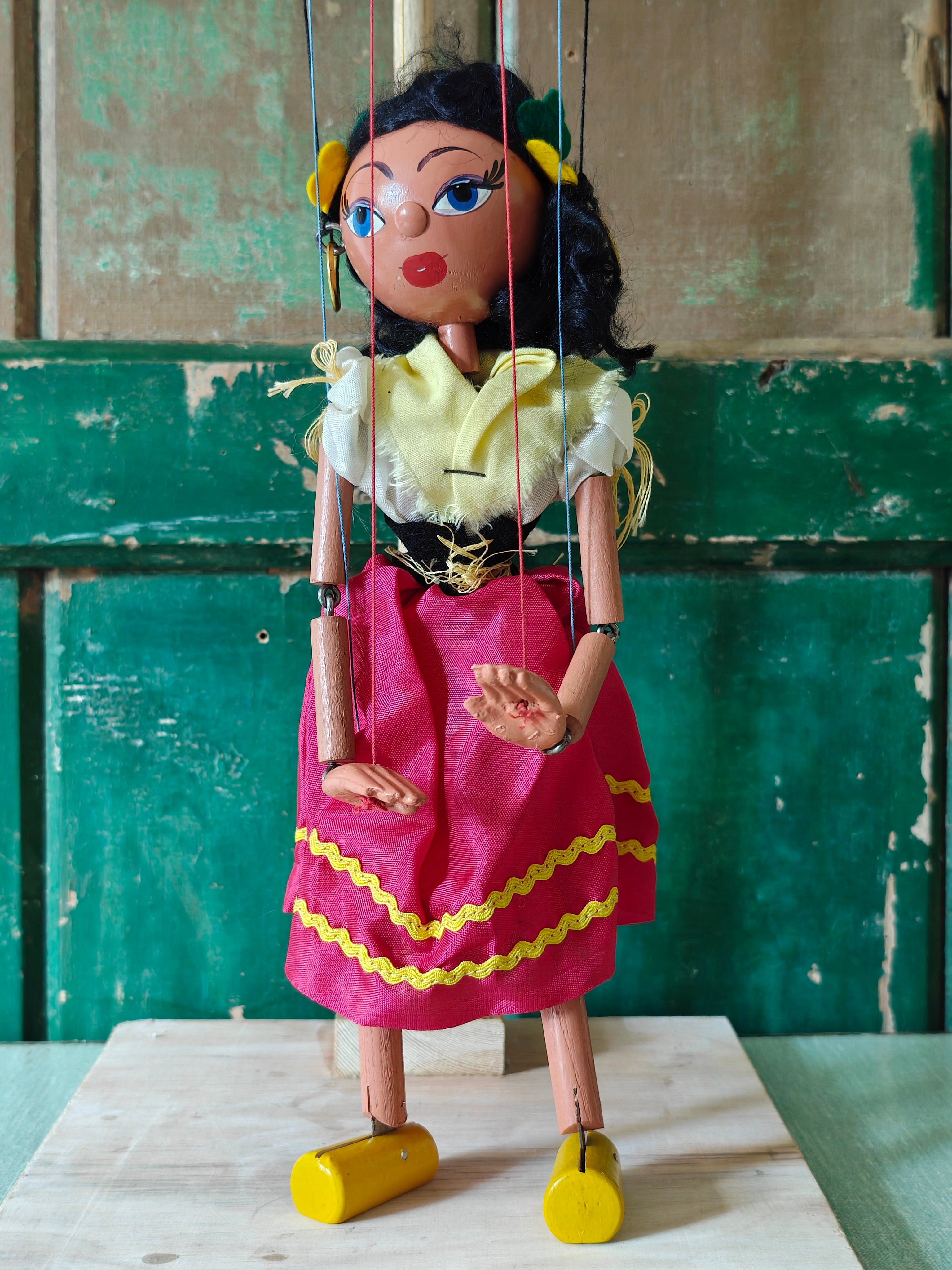 Traditional marionette puppet with a colorful outfit 