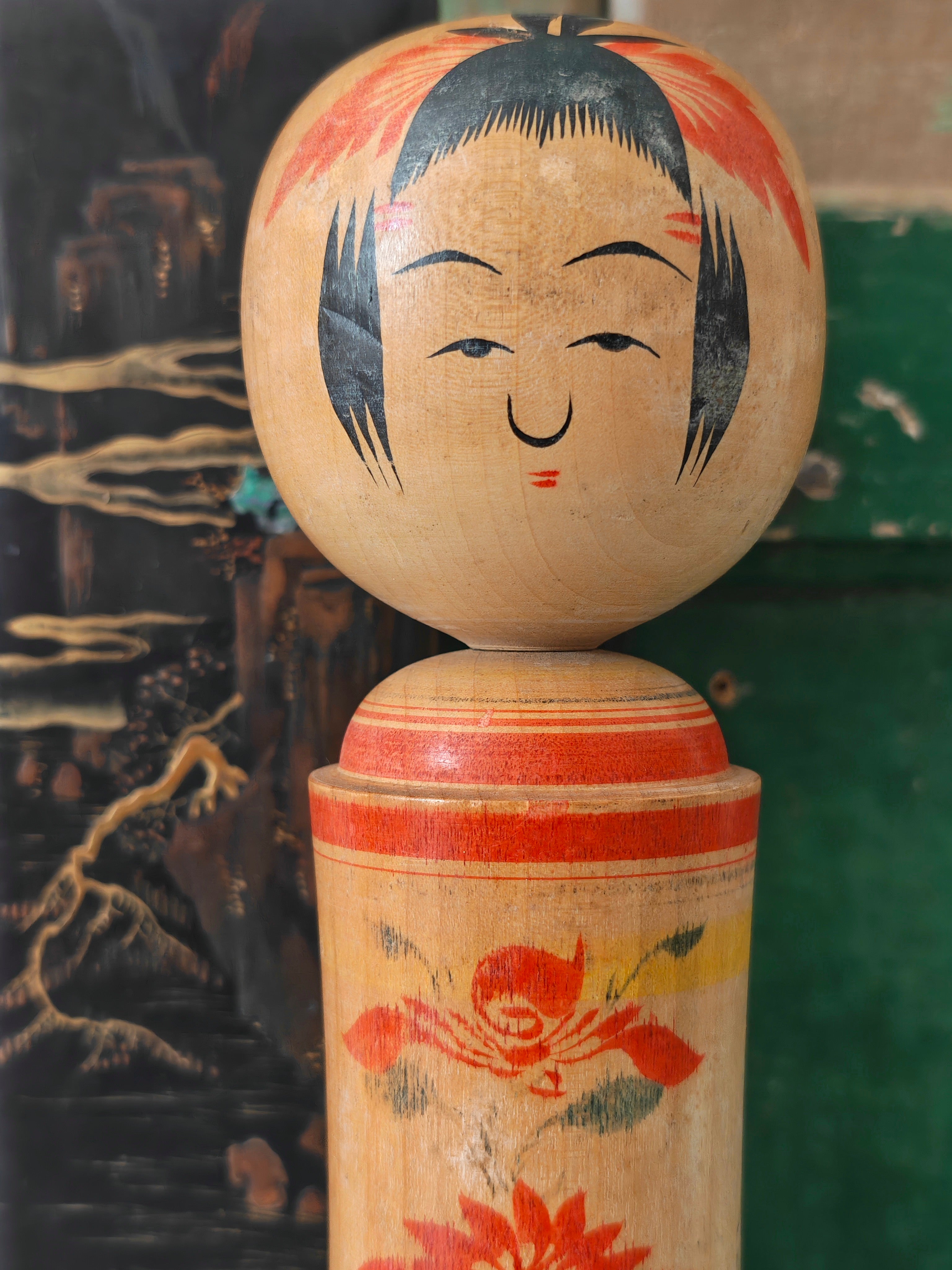 Traditional Japanese kokeshi doll showing face