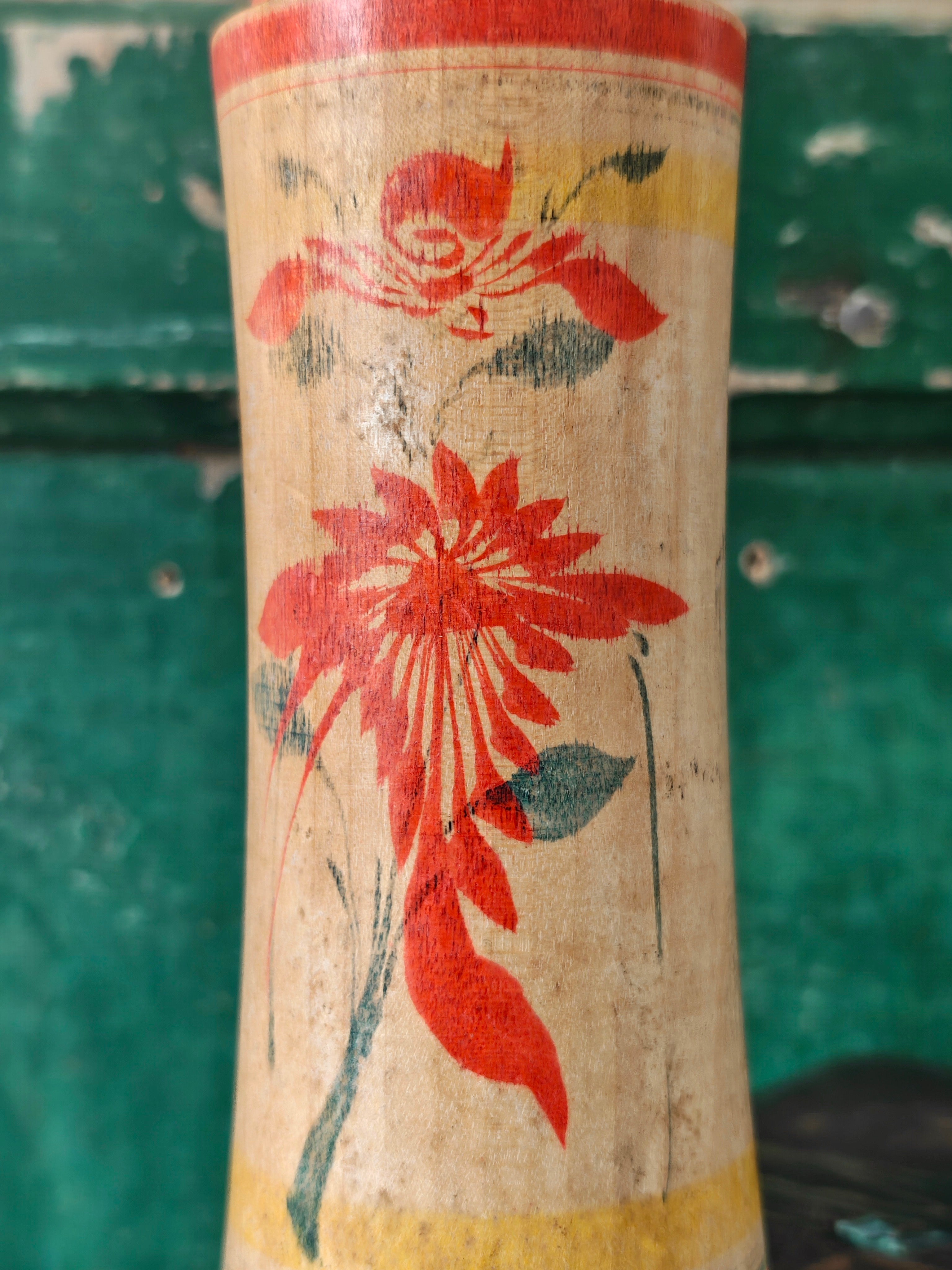 Hand painted decoration of a Kokeshi doll