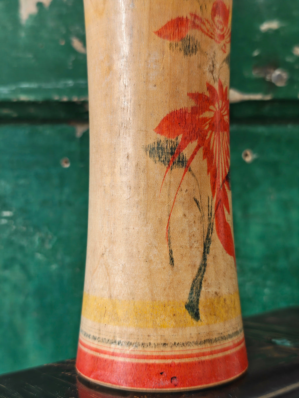 Hand painted decoration of a Kokeshi doll