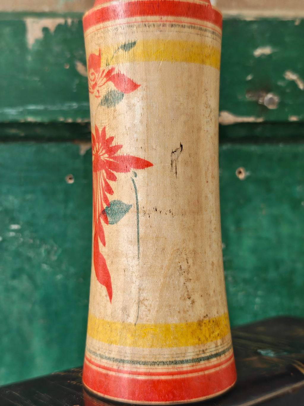 Hand painted decoration of a Kokeshi doll