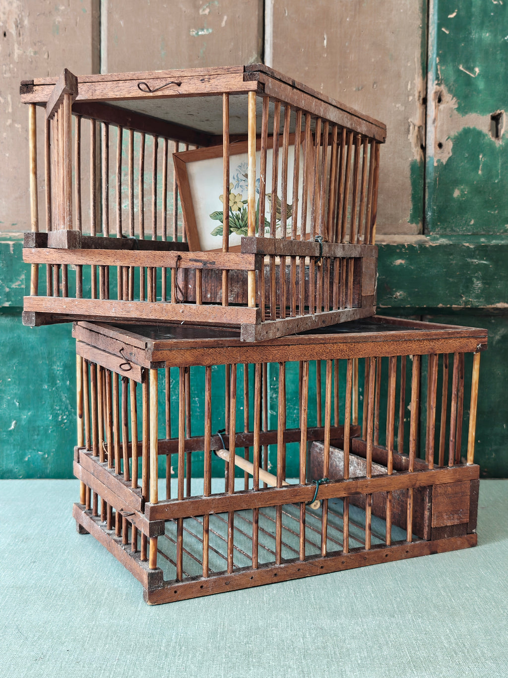 Stacked wooden bird cages